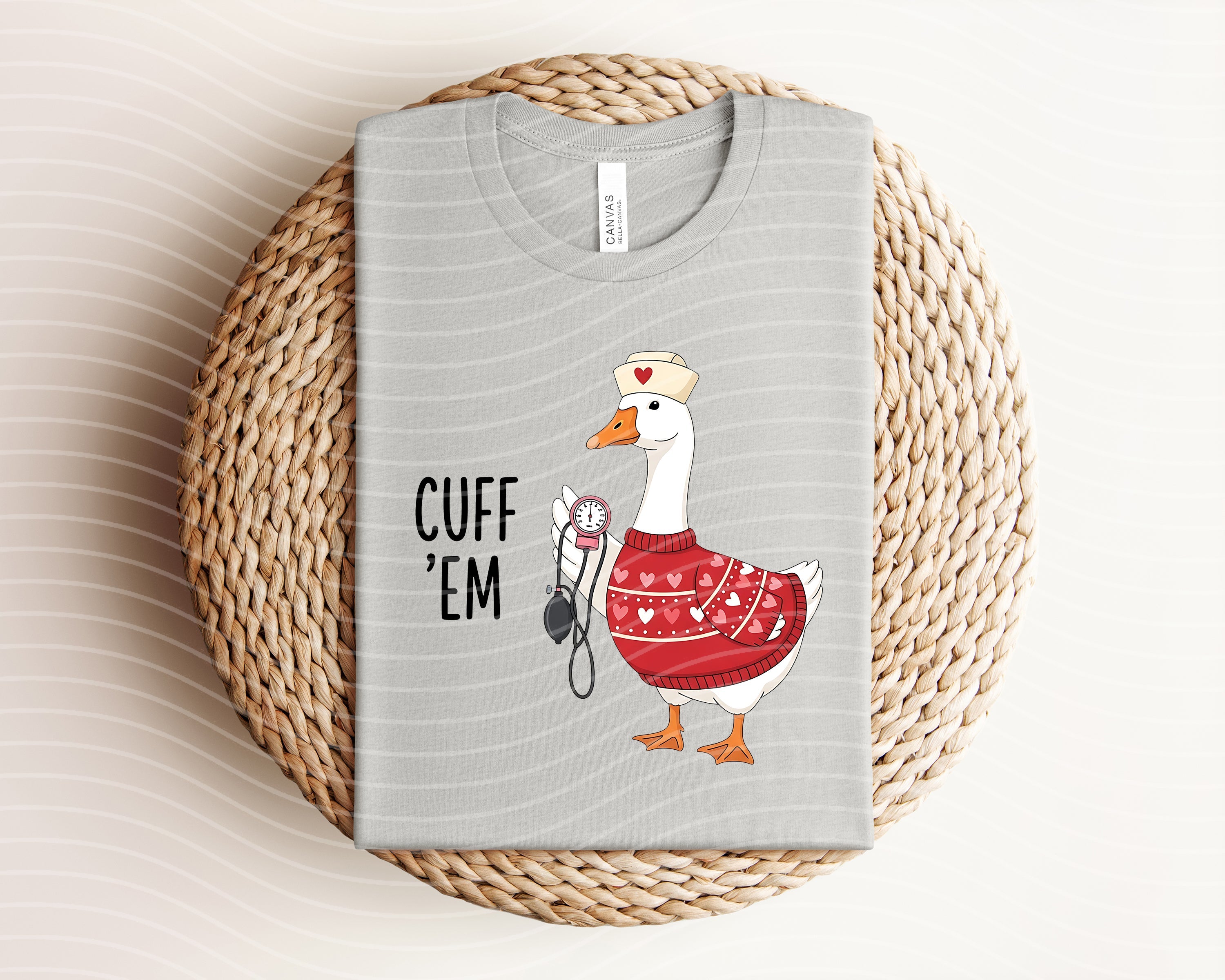 Anchored Grace Boutique Cuff Em Graphic Tee featuring bold graphic design and casual fit, displayed on a plain background.