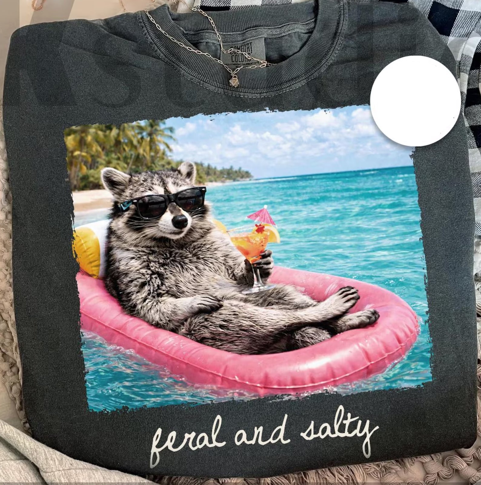Feral and Salty graphic tee by Anchored Grace Boutique featuring bold, nautical-inspired design on soft cotton fabric.