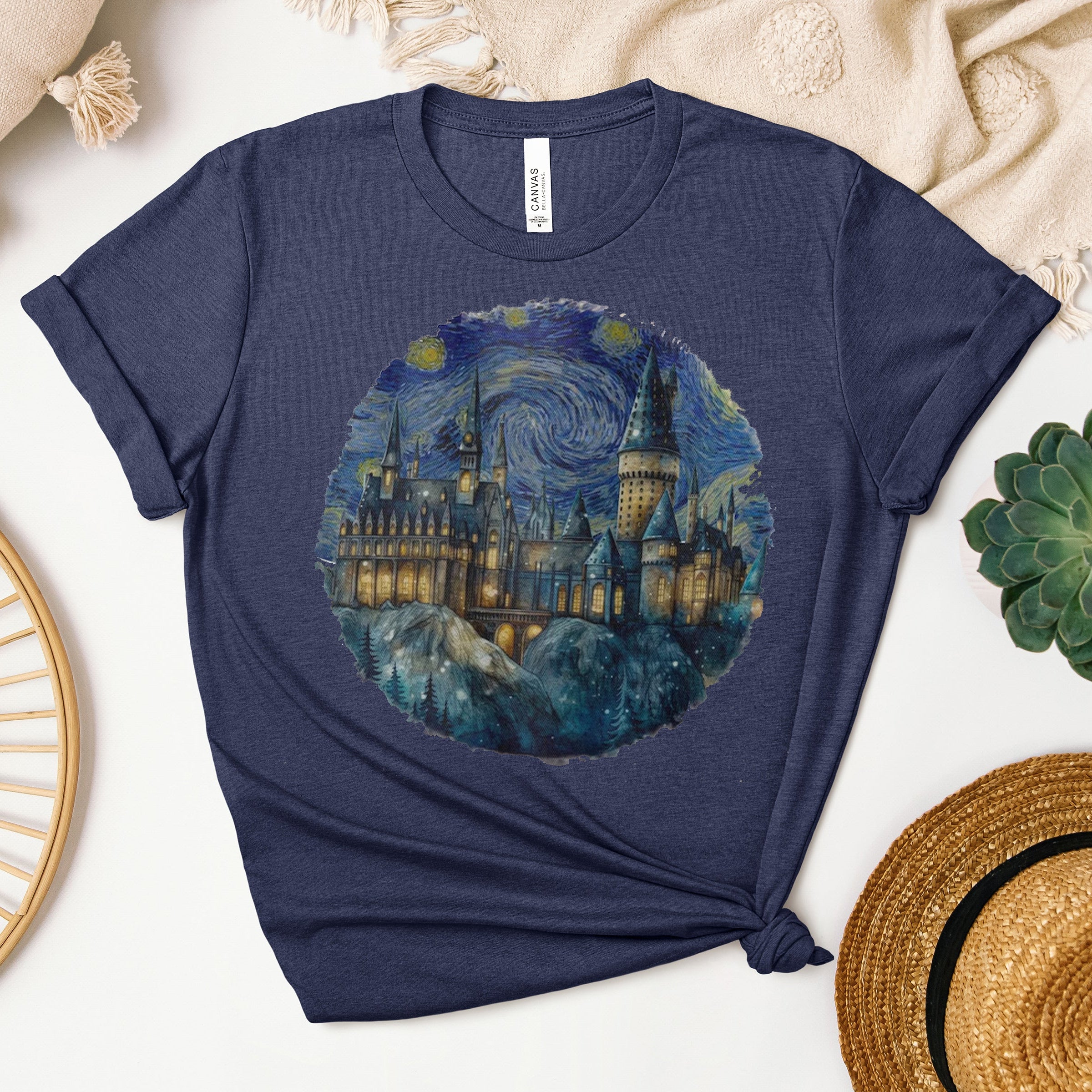 Hogwarts Starry Night graphic tee by Anchored Grace Boutique featuring a celestial Hogwarts design on a black casual t-shirt
