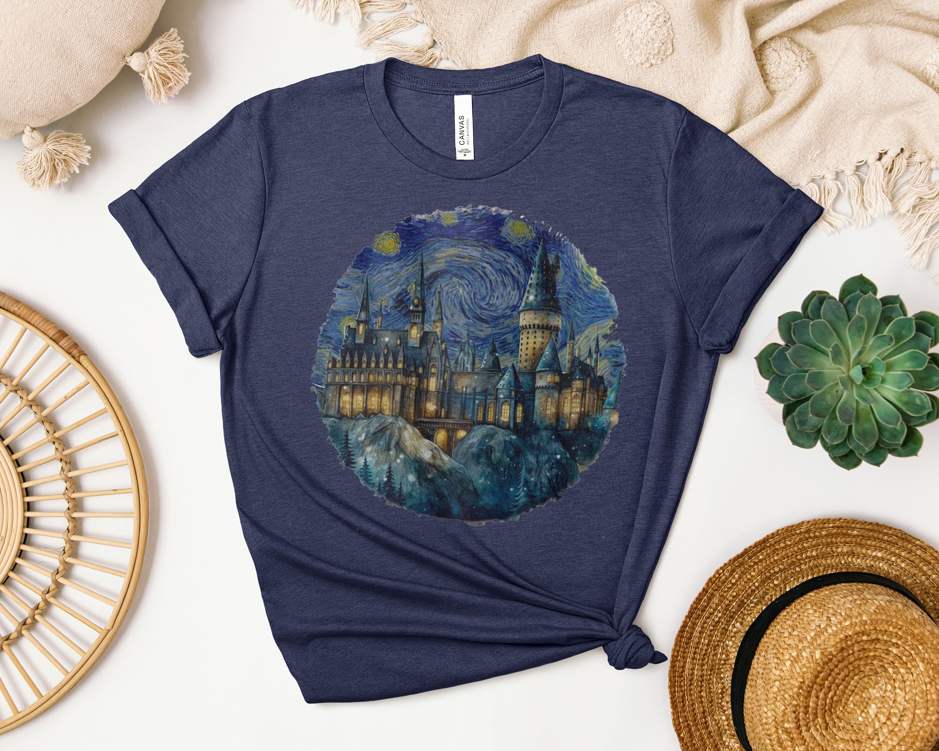 Hogwarts Starry Night graphic tee by Anchored Grace Boutique featuring a celestial Hogwarts design on a comfortable casual shirt.