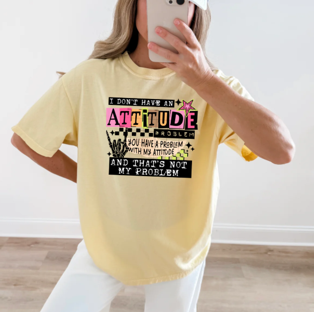 Black graphic tee from Anchored Grace Boutique with "I Don’t Have an Attitude Problem" print, casual and trendy clothing.