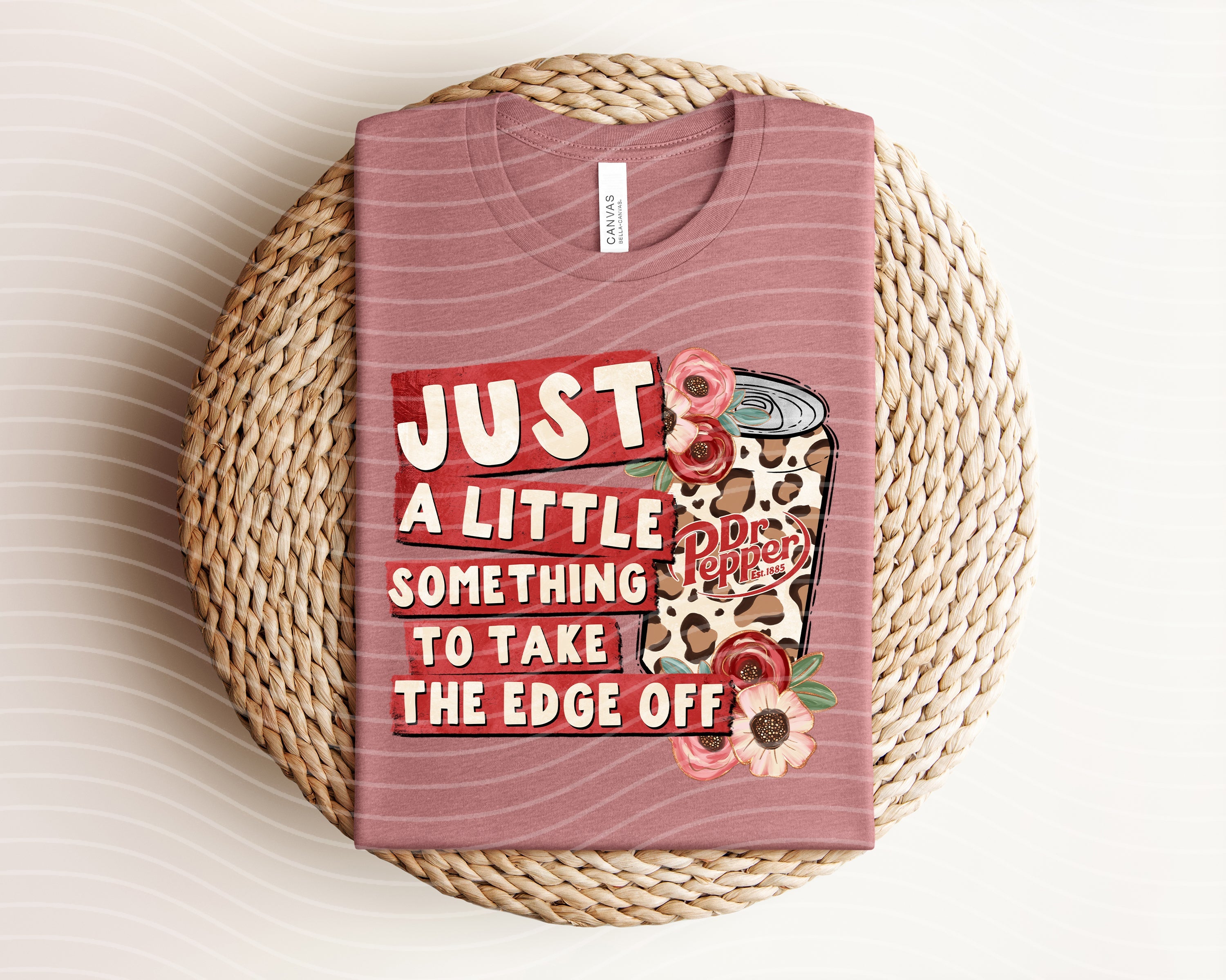 Anchored Grace Boutique graphic tee featuring a design with the phrase "Just a Little Something to Take the Edge Off" on soft cotton fabric.