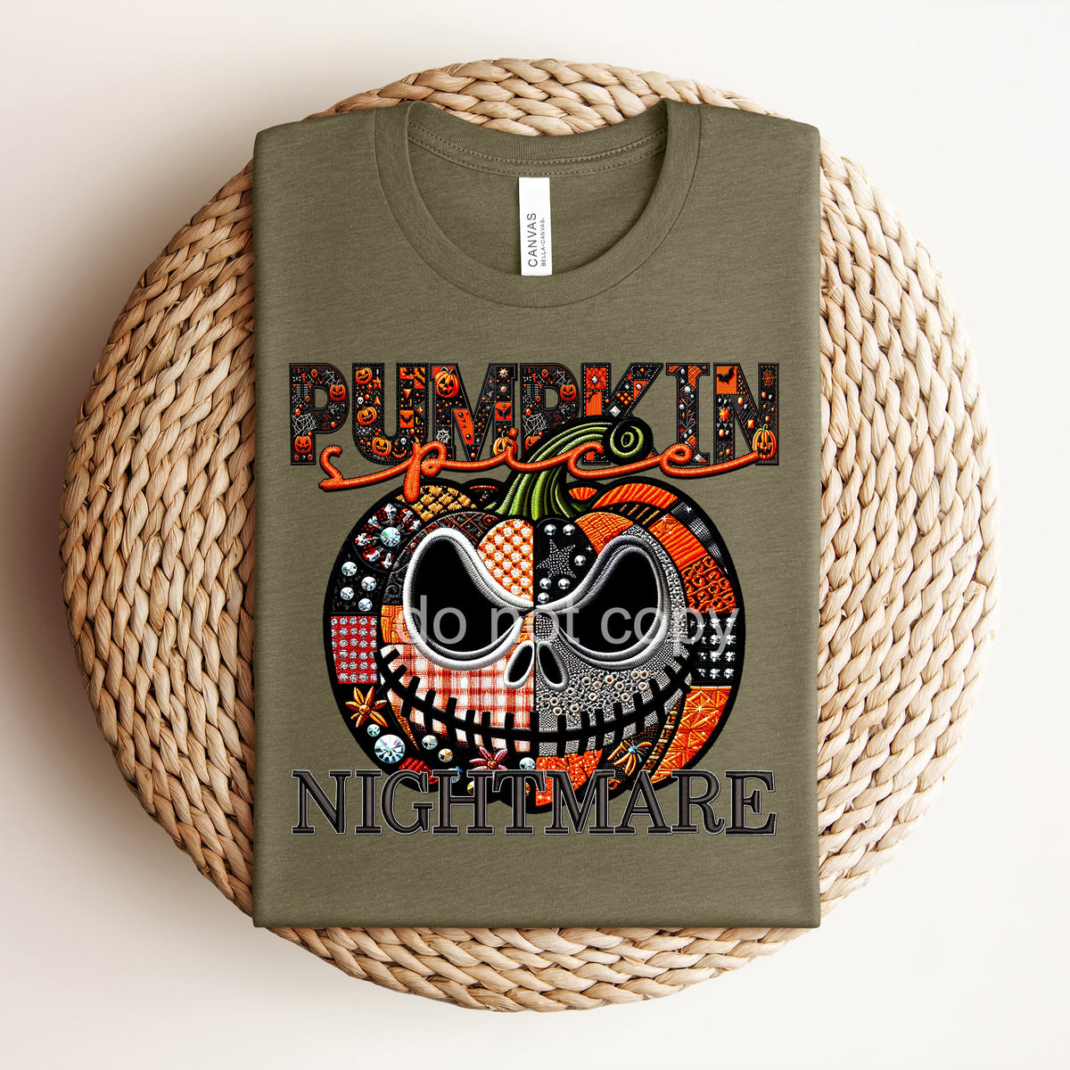 Pumpkin Spice Nightmare graphic tee by Anchored Grace Boutique featuring fall-themed spooky pumpkin design on soft fabric.