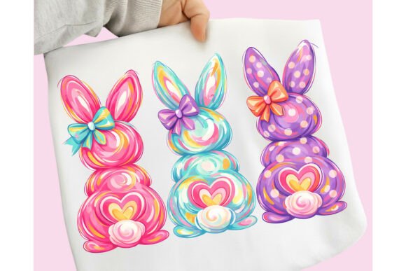 Colorful watercolor bunny graphic tee by Anchored Grace Boutique featuring a playful bunny design on a casual cotton t-shirt.