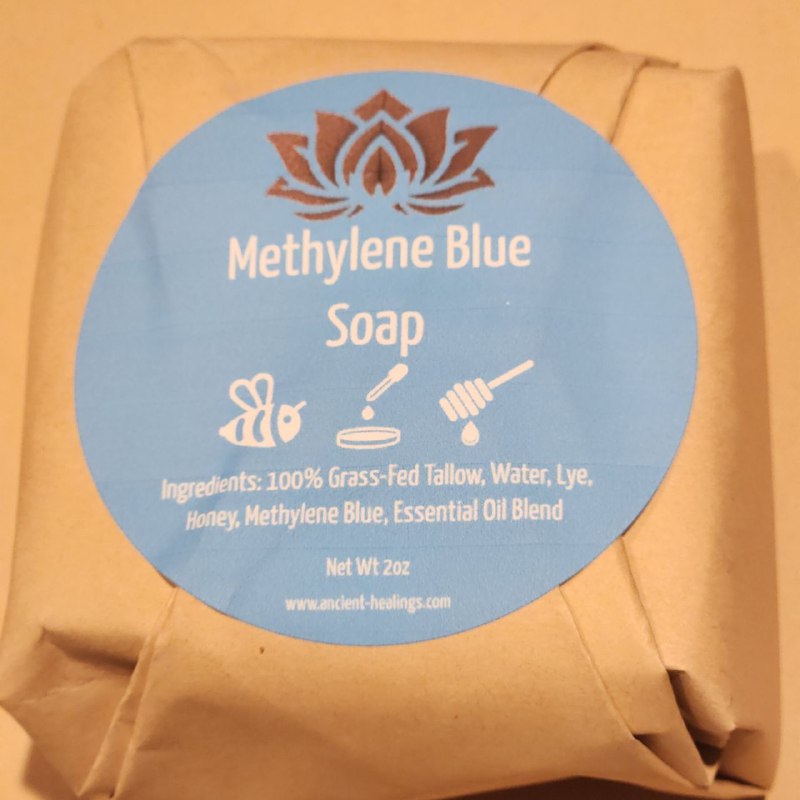 Bar of Ancient Health & Healings Methylene Blue Tallow Soap with lavender and mint, showcasing its rectangular shape and textured surface.