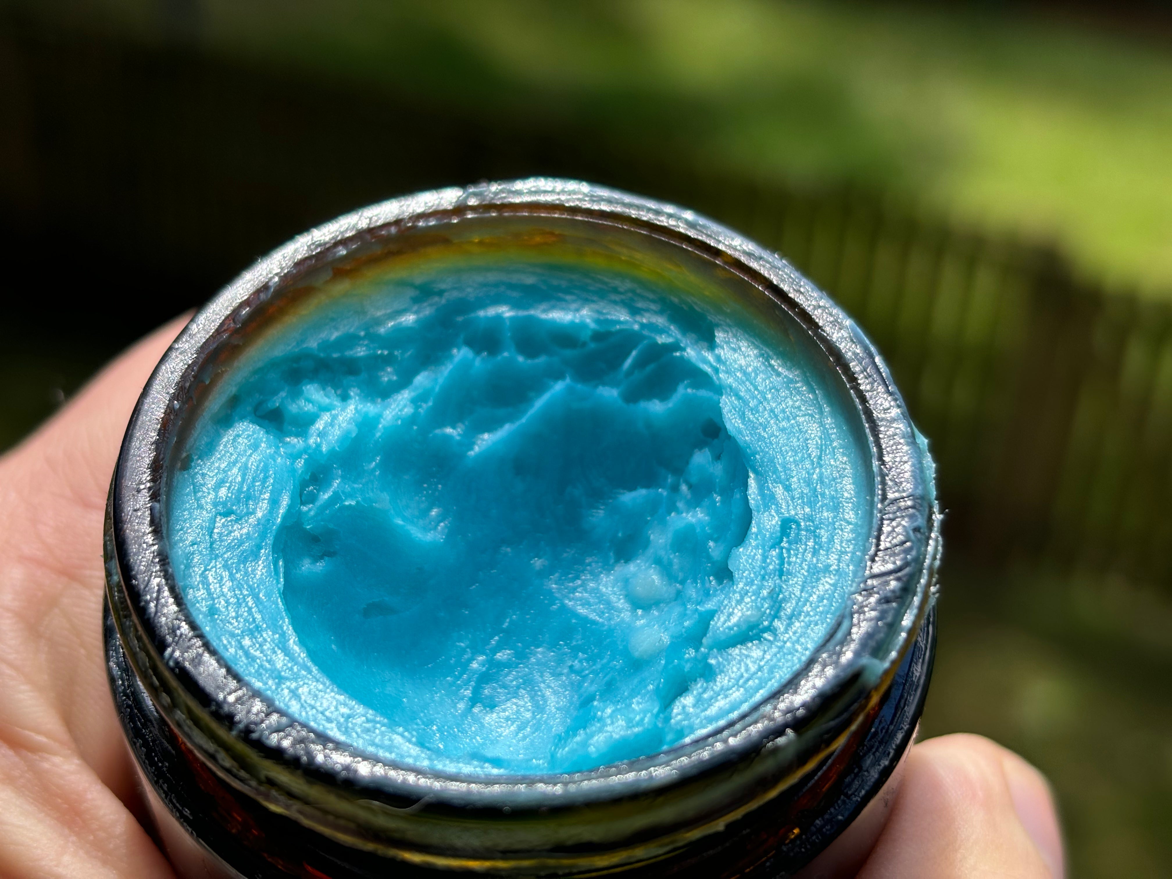 Ancient Health & Healings Methylene Blue Tallow Balm in a 2oz jar, natural skin care balm with blue-tinted formula.