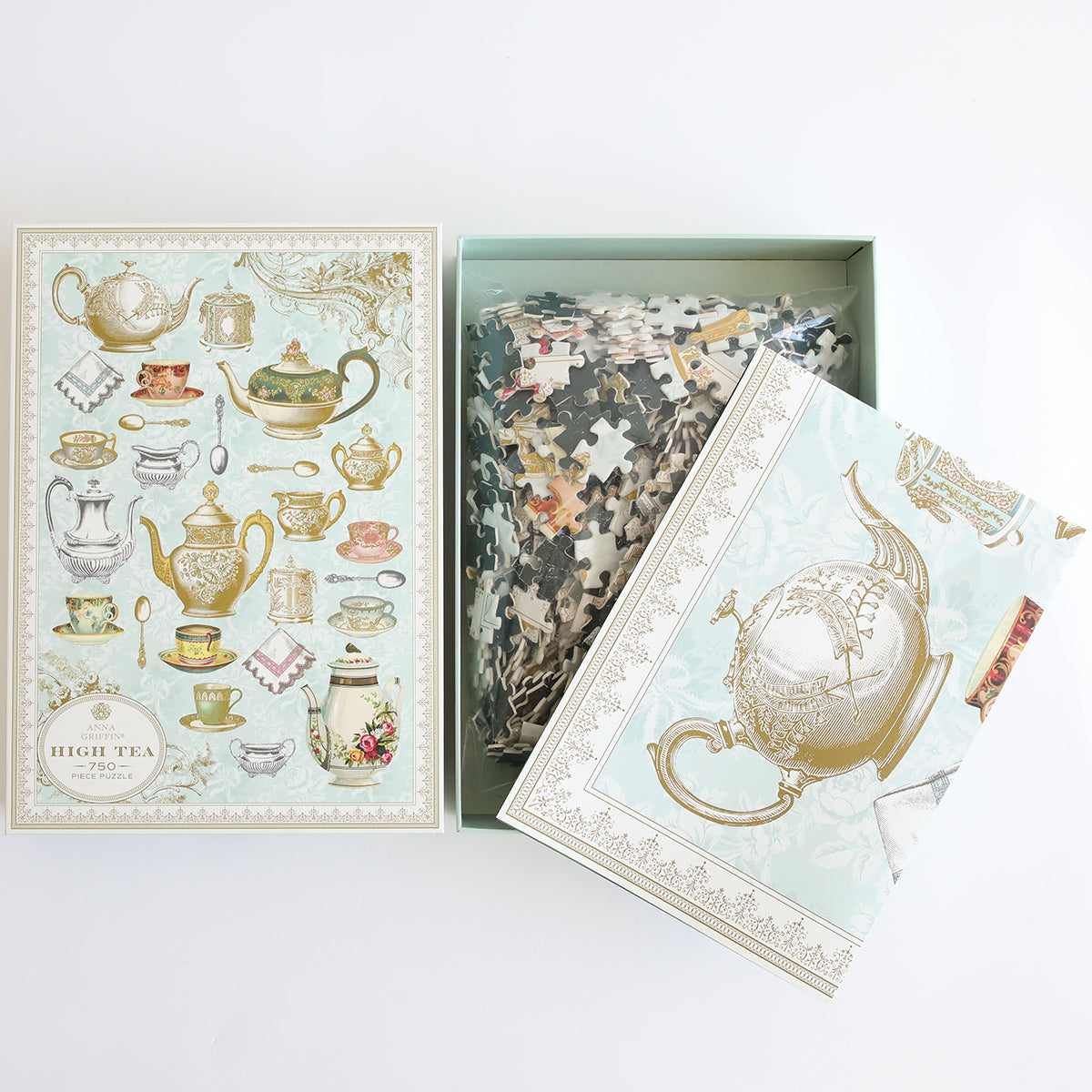 High Tea jigsaw puzzle featuring elegant teapots, cups, and floral designs by Anna Griffin Inc.