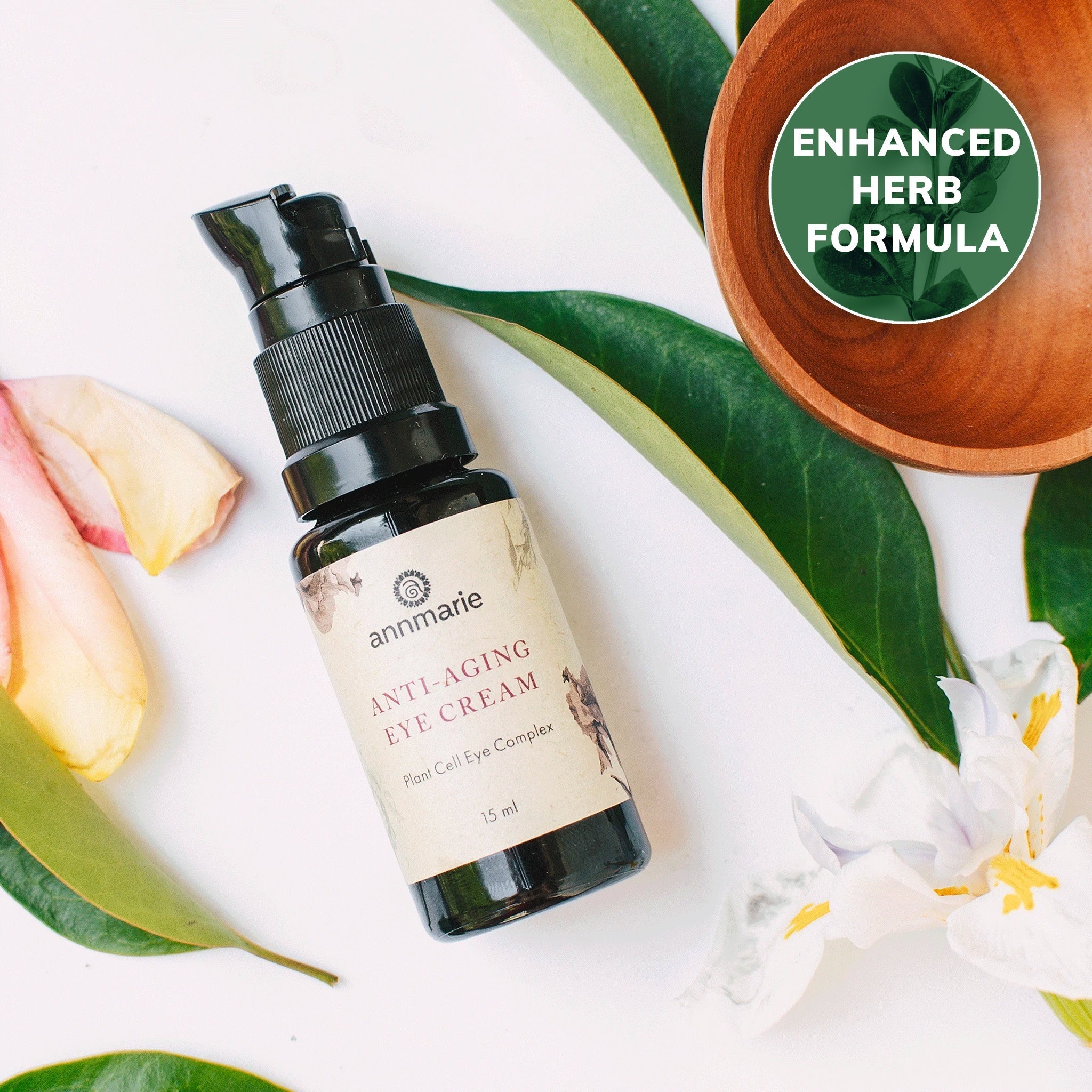 Anti-aging eye cream by Annmarie Skin Care in a 15ml jar, designed to reduce fine lines and brighten the eye area.