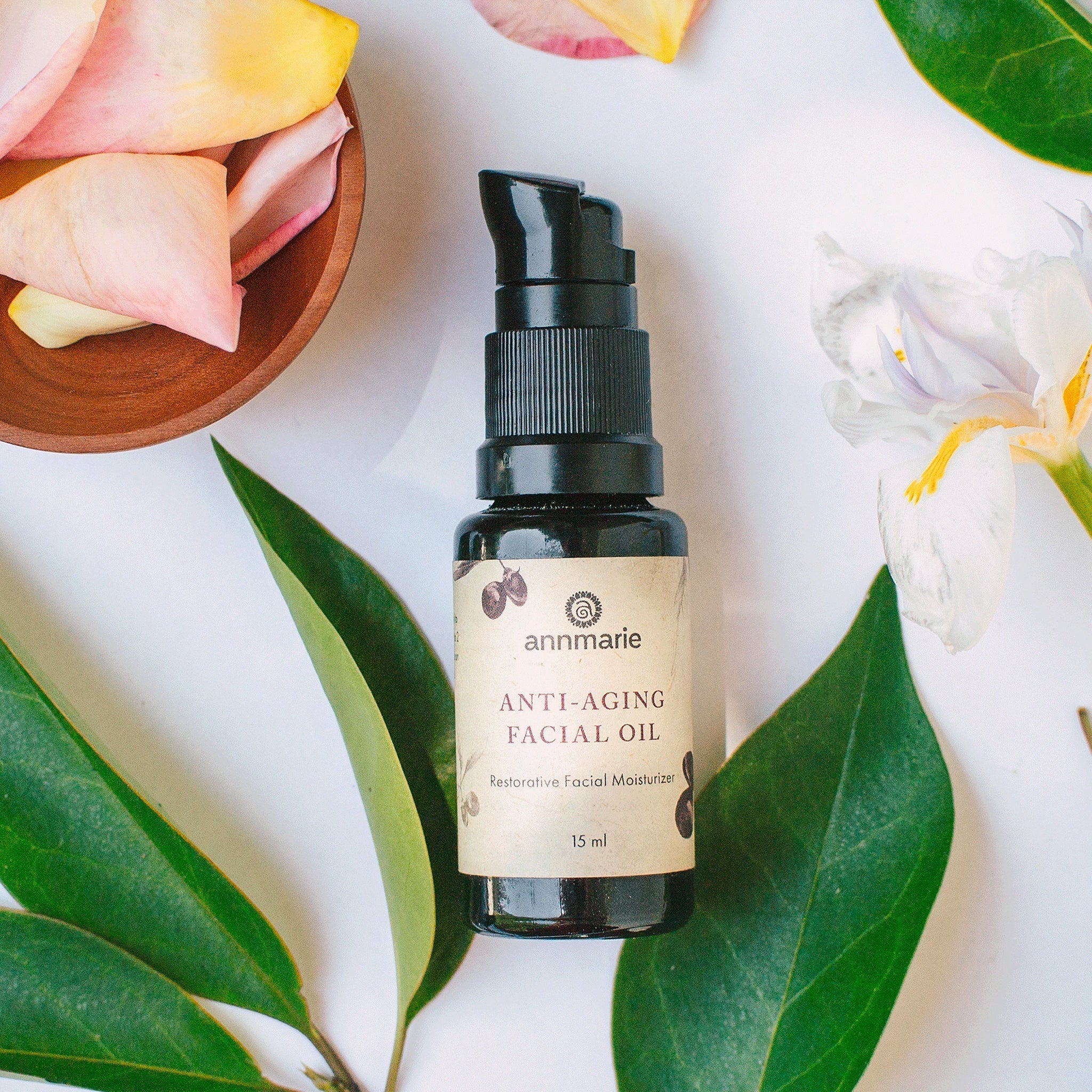 Anti-aging facial oil by Annmarie Skin Care in a 15ml bottle, featuring a natural skincare product with nourishing ingredients.
