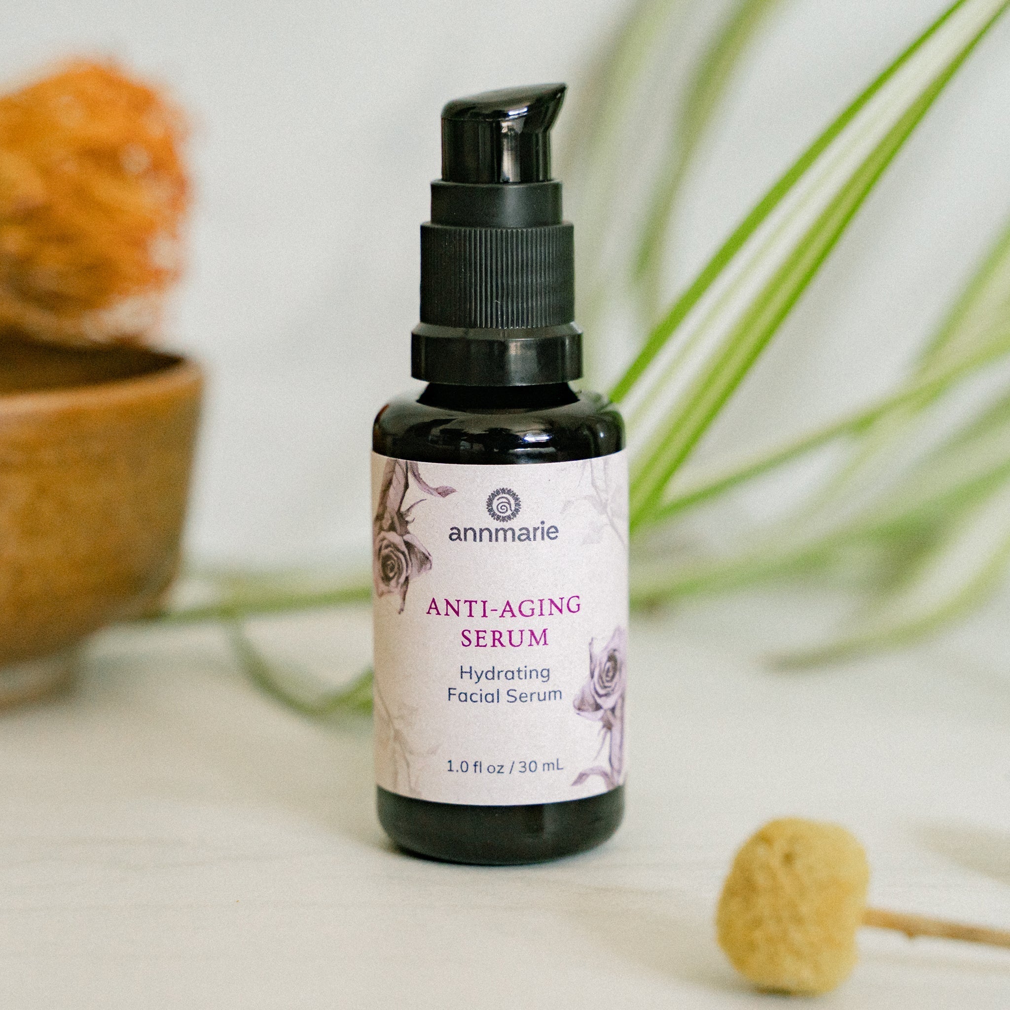 Bottle of Annmarie Skin Care Anti-Aging Serum in 30ml container, featuring a sleek design and clear labeling.