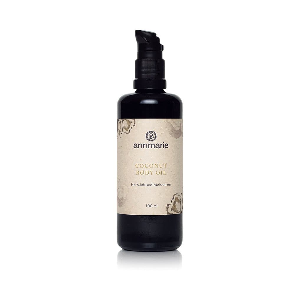 Bottle of Annmarie Skin Care Coconut Body Oil in 100ml size, featuring a natural coconut scent and nourishing skincare formula.