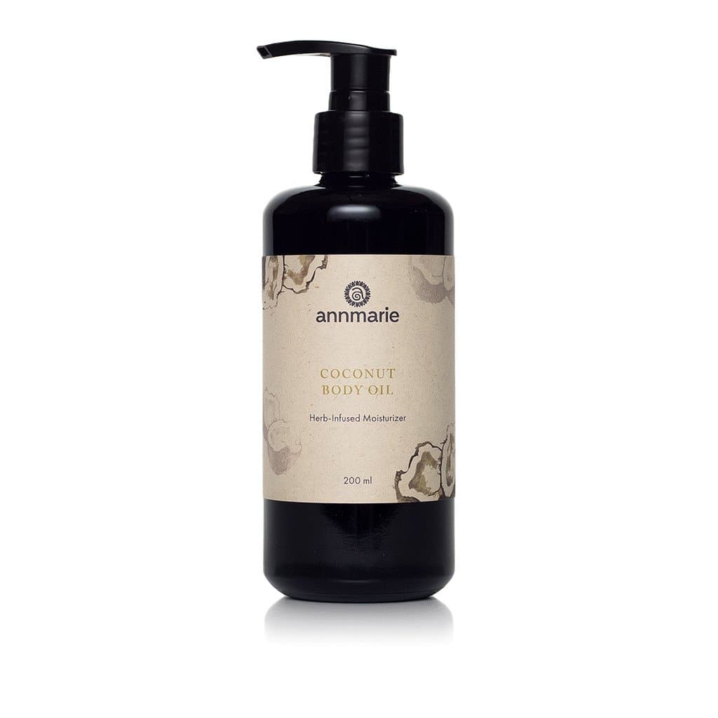Bottle of Annmarie Skin Care Coconut Body Oil in 200ml size, featuring a natural coconut scent and nourishing skin formula.