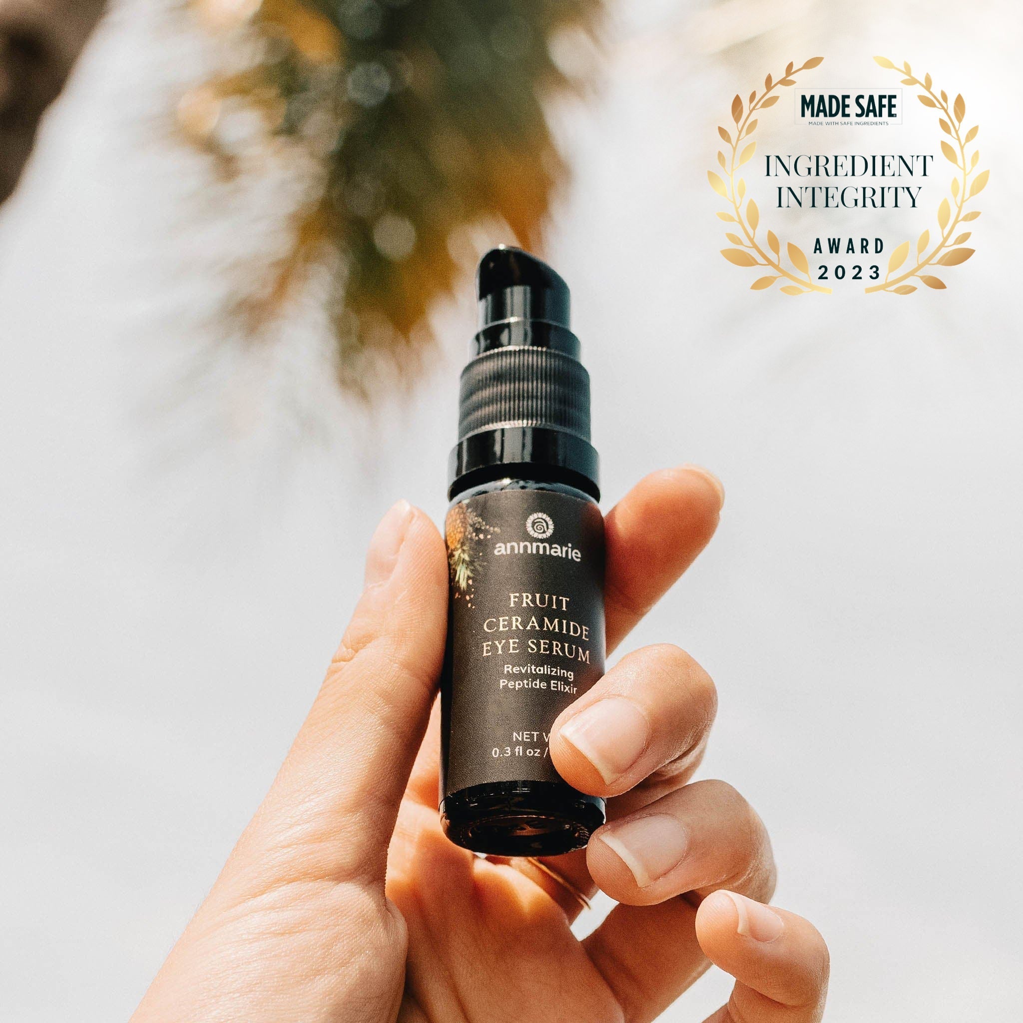 Annmarie Skin Care Fruit Ceramide Eye Serum in 10ml bottle, natural eye treatment with nourishing ingredients, close-up of serum container.