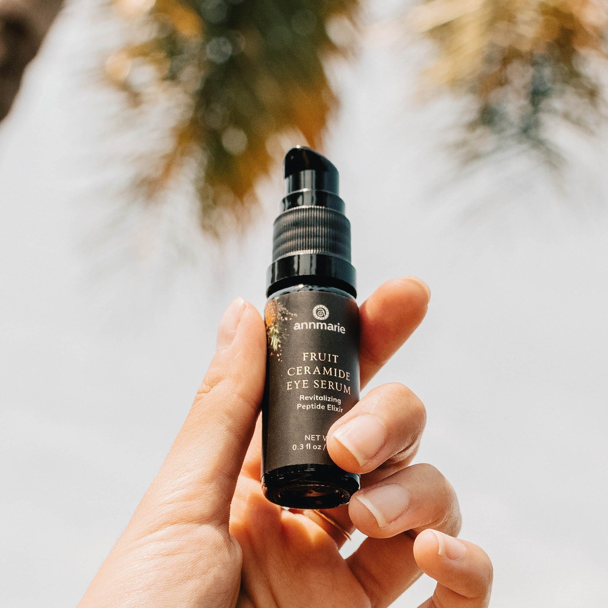 Annmarie Skin Care Fruit Ceramide Eye Serum in 10ml bottle, showing the product with packaging and natural ingredients.