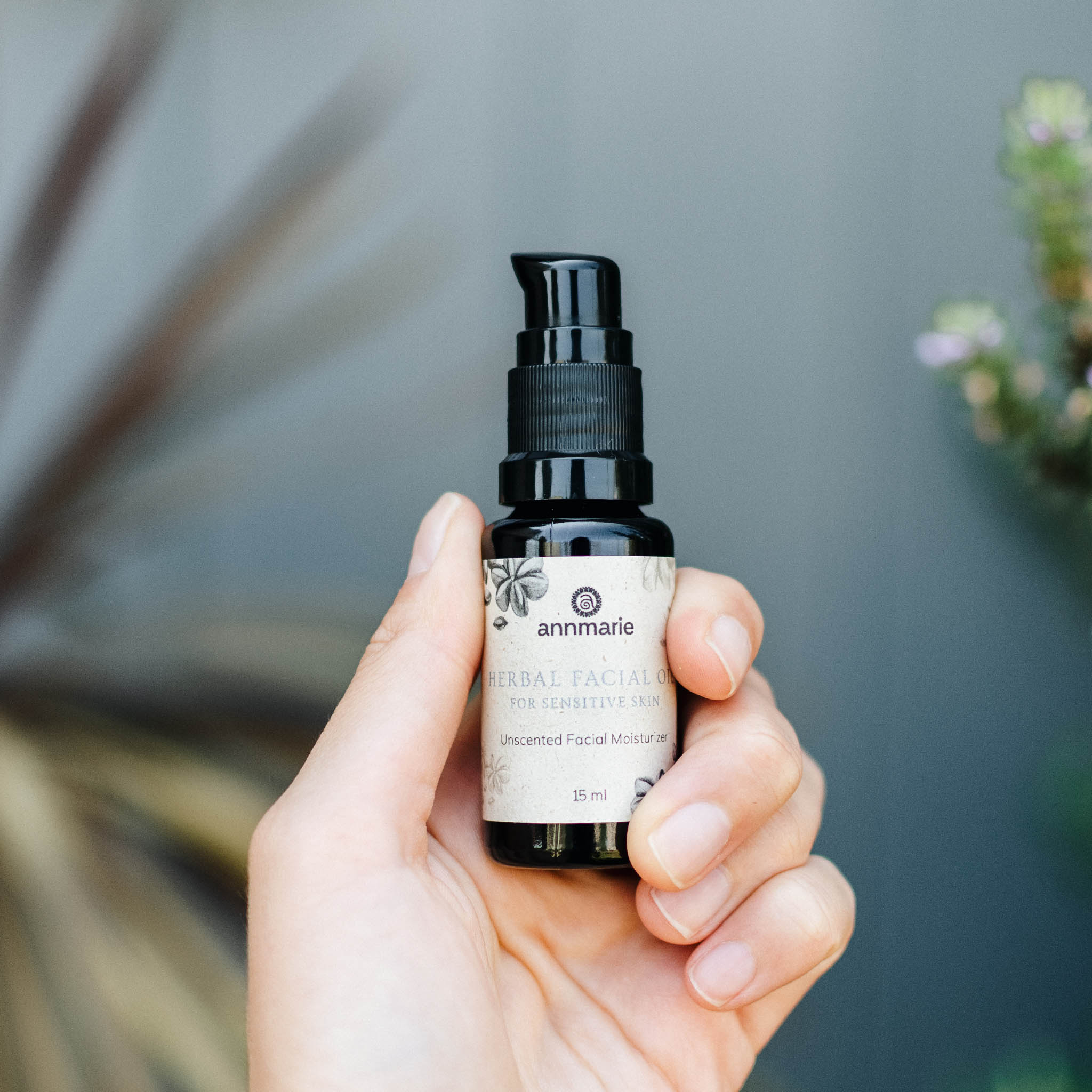 Herbal facial oil for sensitive skin in a 15ml bottle by Annmarie Skin Care, featuring natural botanical ingredients.