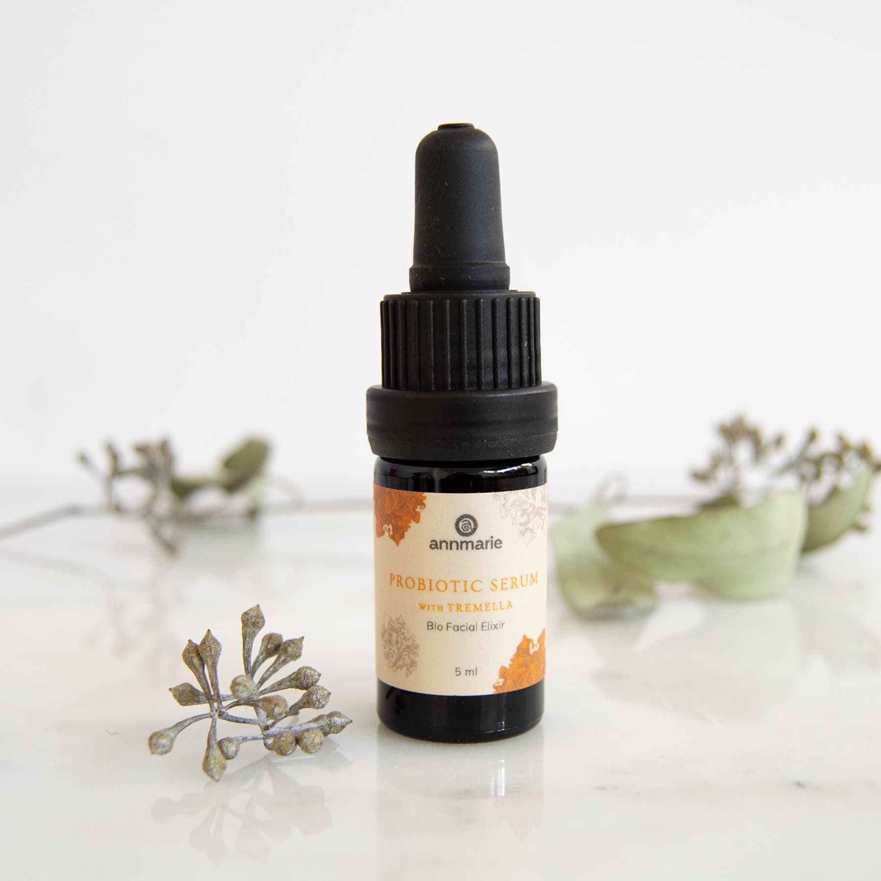 Small 5ml trial size of Annmarie Skin Care probiotic serum with tremella in a clear glass bottle for facial hydration and skin health.