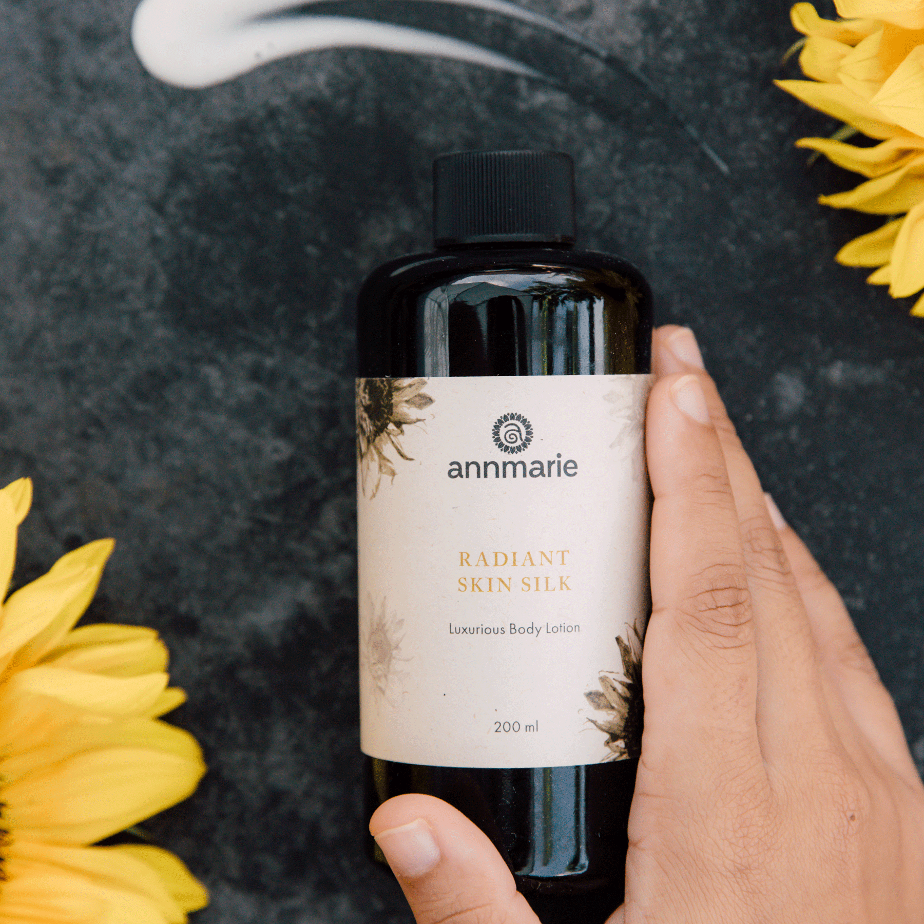 Annmarie Skin Care Radiant Skin Silk Body Lotion in 200ml bottle, smooth, hydrating body lotion with a silky texture.