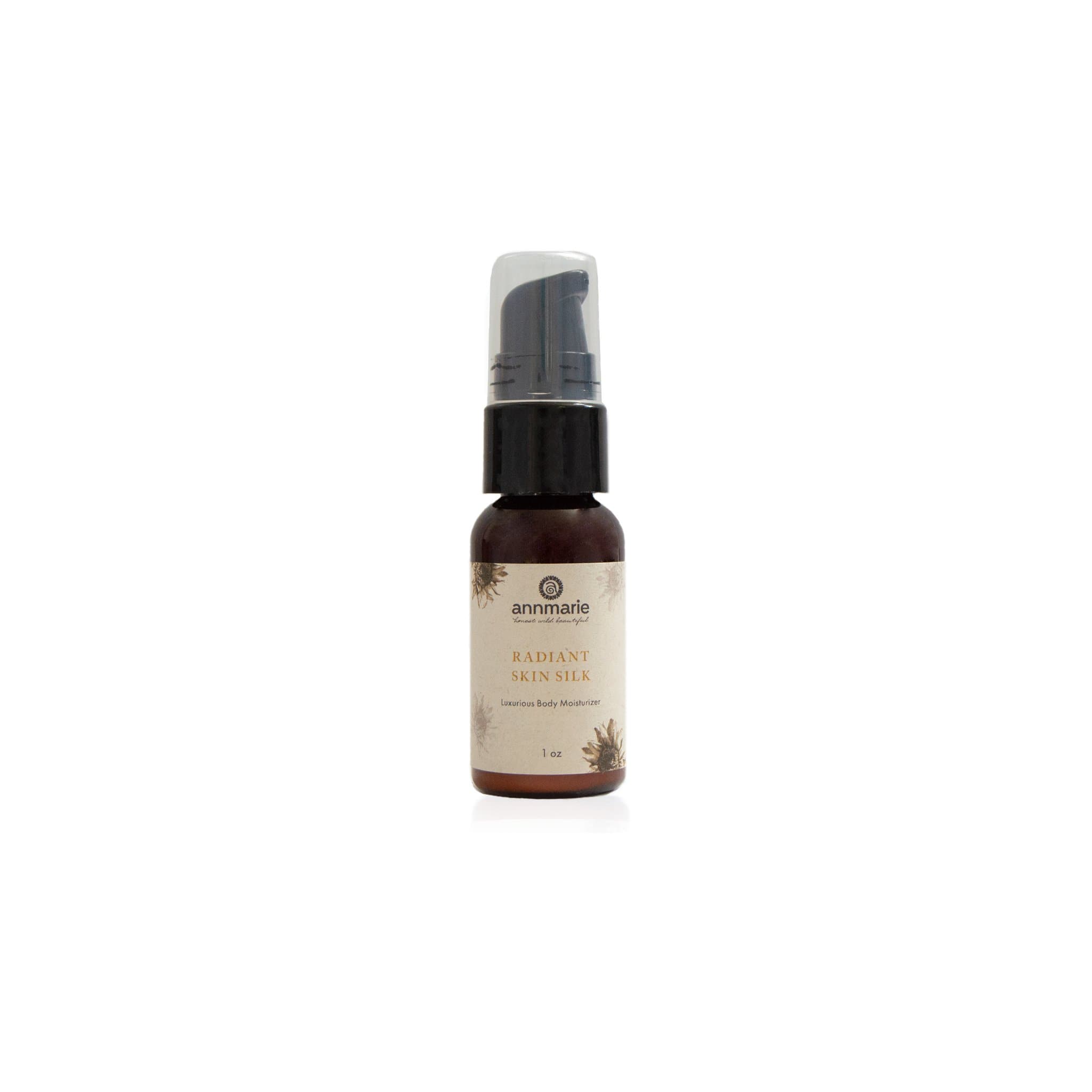 Travel-size Annmarie Skin Care Radiant Skin Silk Body Lotion, 1 fl oz, featuring smooth, nourishing body moisturizer in a compact bottle.