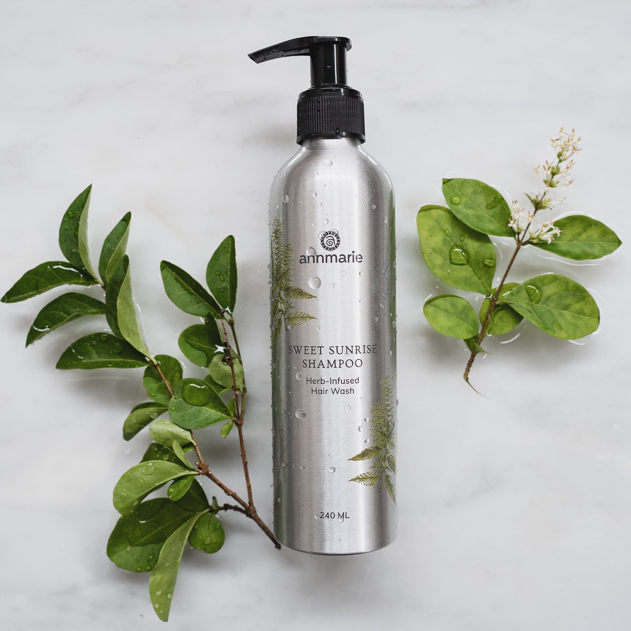 Annmarie Skin Care Sweet Sunrise Shampoo bottle, 240ml, with natural ingredients and vibrant packaging visible.