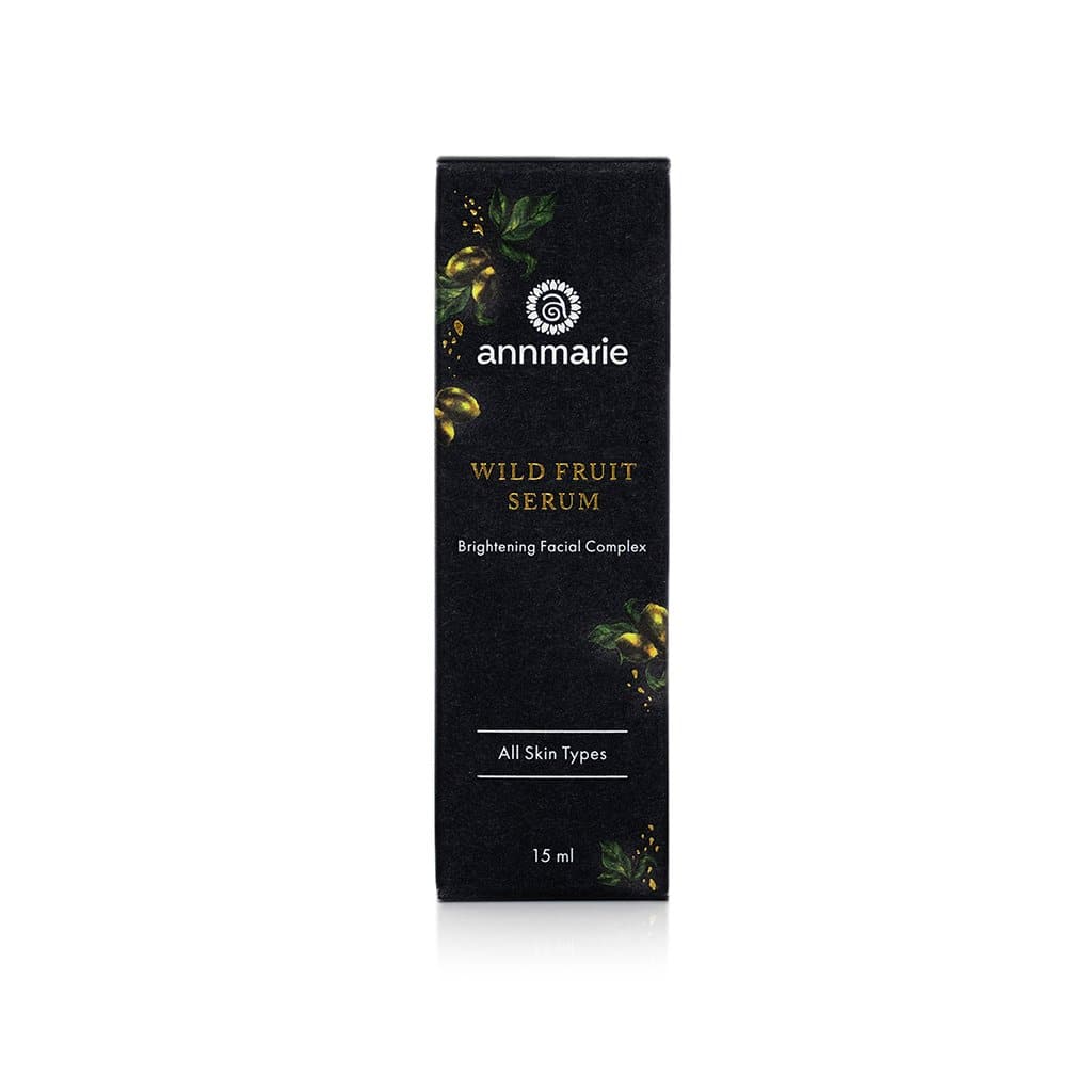 Bottle of Annmarie Skin Care Wild Fruit Serum, a brightening facial complex in a 15ml container with natural ingredients.