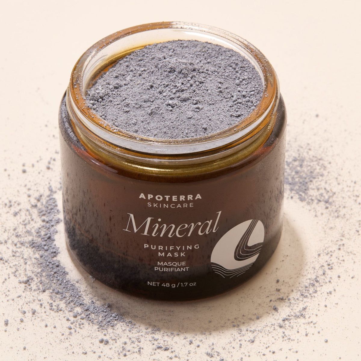 Apoterra mineral purifying mask treatment with charcoal and natural clay, showing its rich, textured mask for deep skin cleansing.