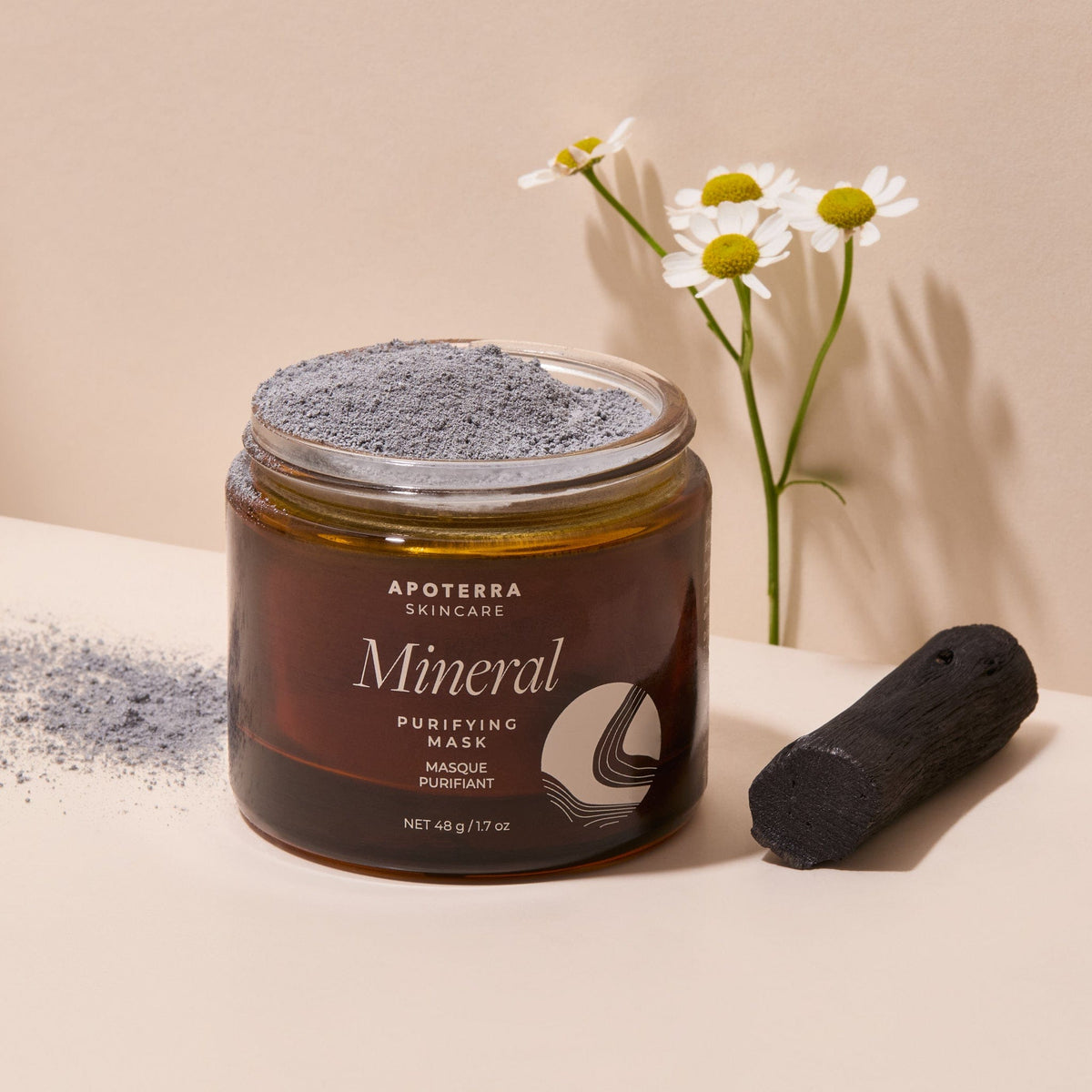 Apoterra Mineral Purifying Mask with charcoal and chamomile, a treatment for deep cleansing and skin detoxification.