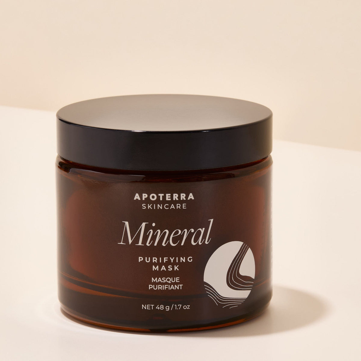 Apoterra Mineral Purifying Mask in a jar, showing the treatment product with natural mineral ingredients and a clean, skincare-ready look.