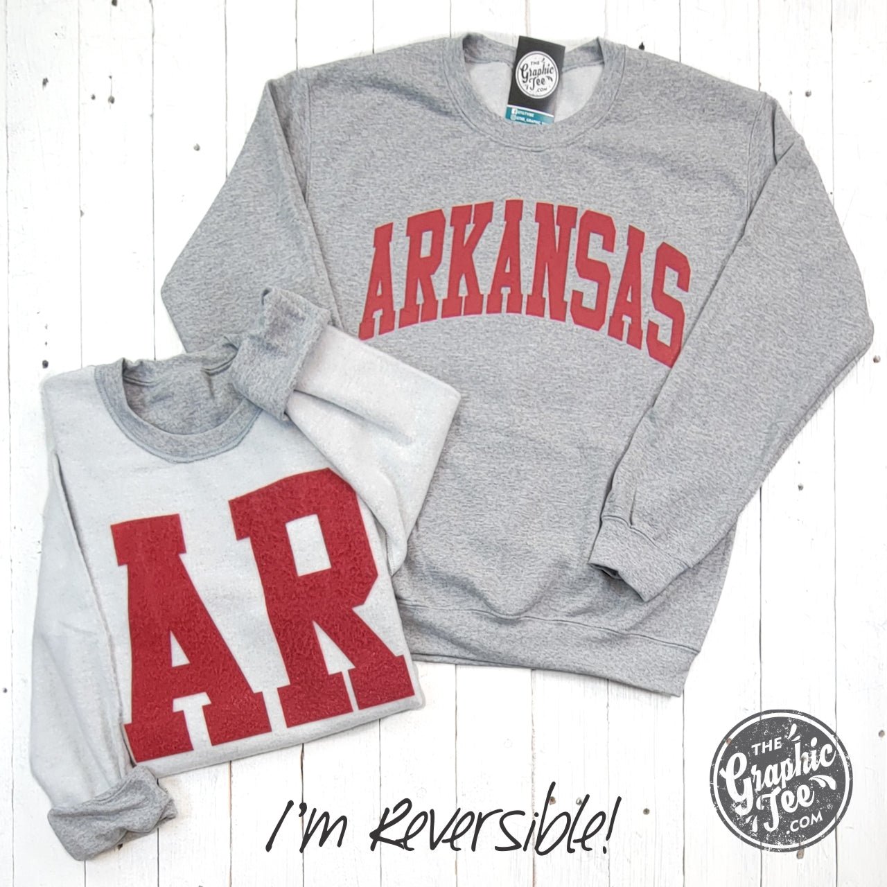 Reversible Arkansas sport grey crewneck sweatshirt by The Graphic Tee, featuring comfortable fabric and Arkansas graphic design.