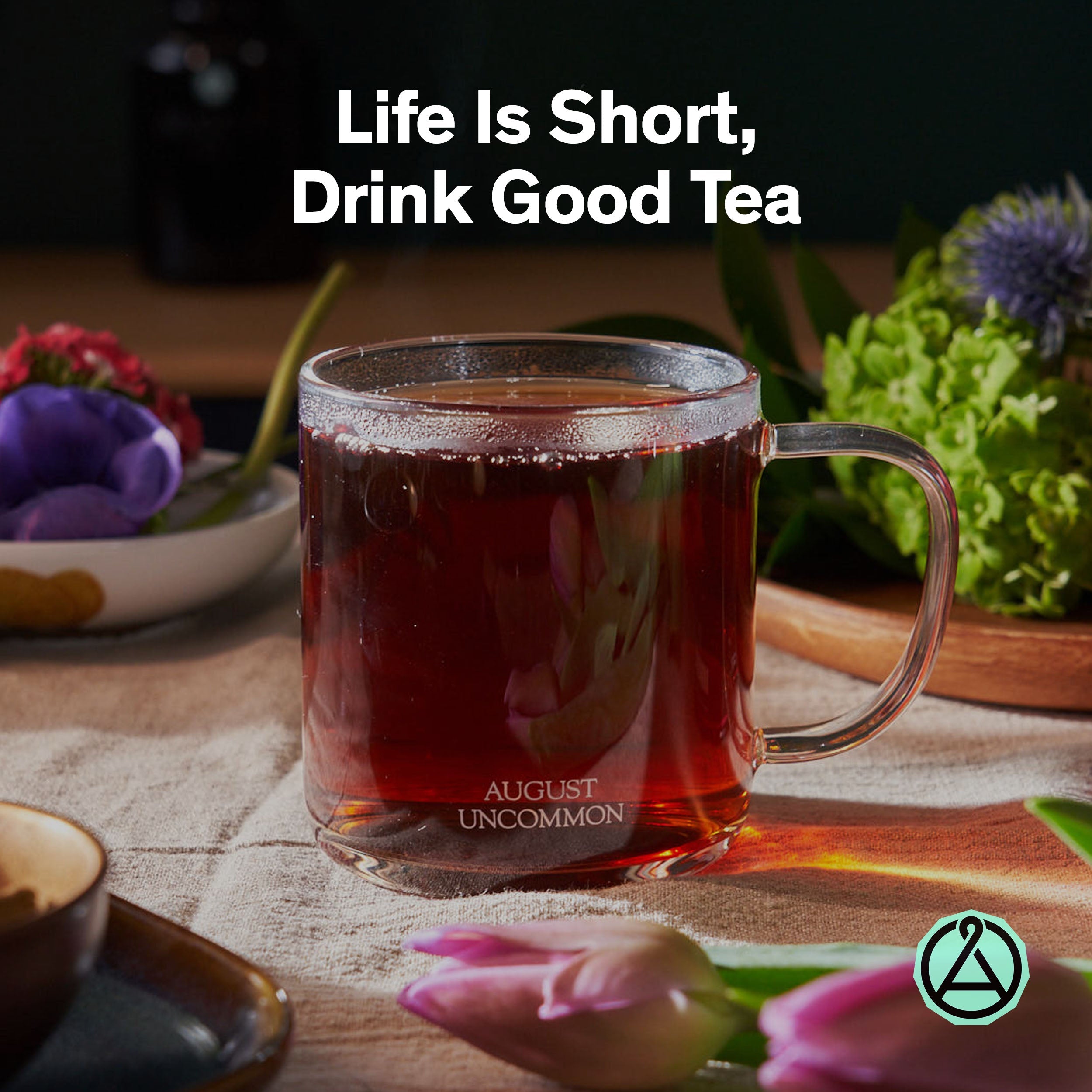 Black tea in a 28-cup tin from August Uncommon, Low Country Bourbon Sugar Black Tea, showcasing the tea leaves and packaging.