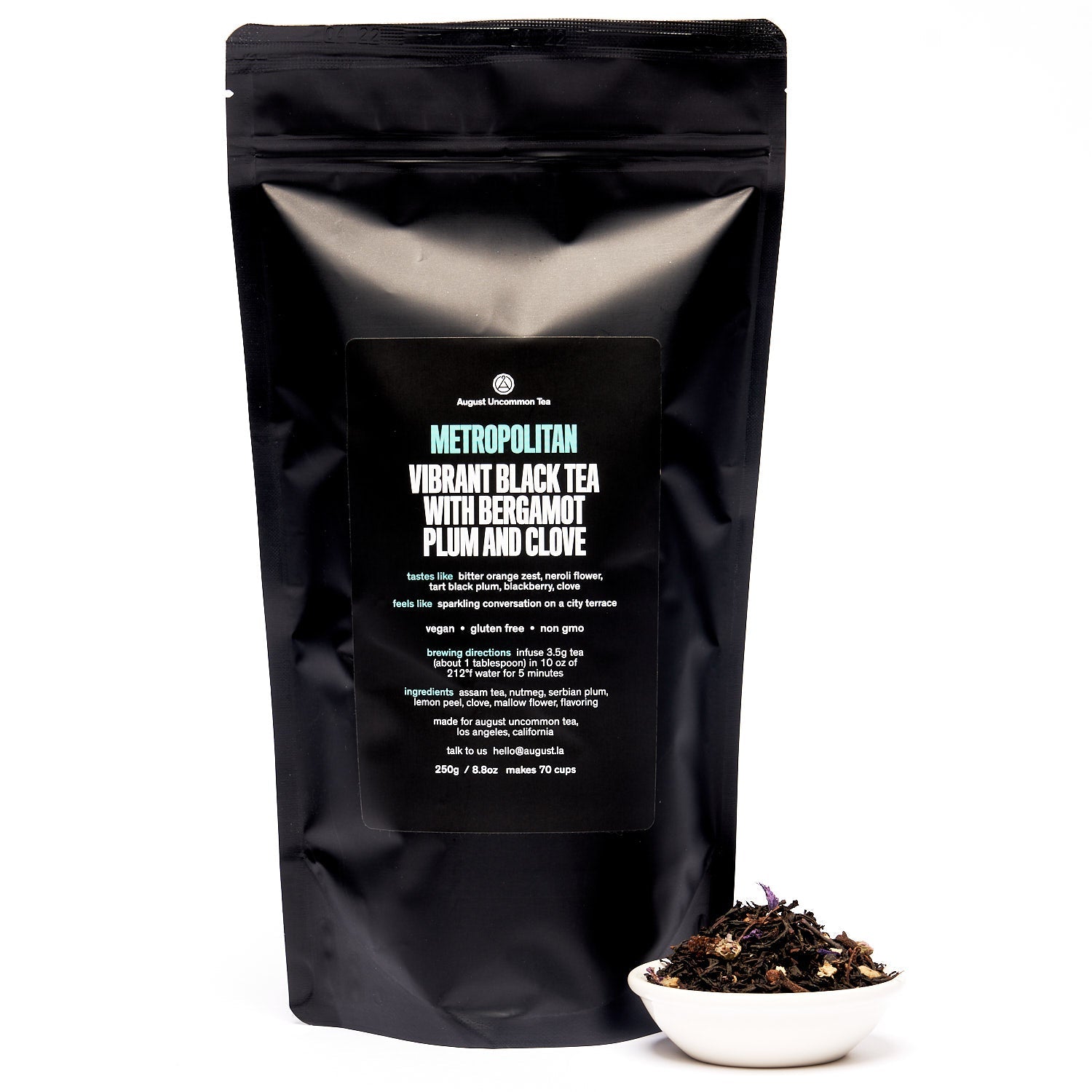 August Uncommon Tea Metropolitan Bergamot Plum Earl Grey Black Tea in a 28-cup tin, showcasing the elegant packaging and tea leaves.