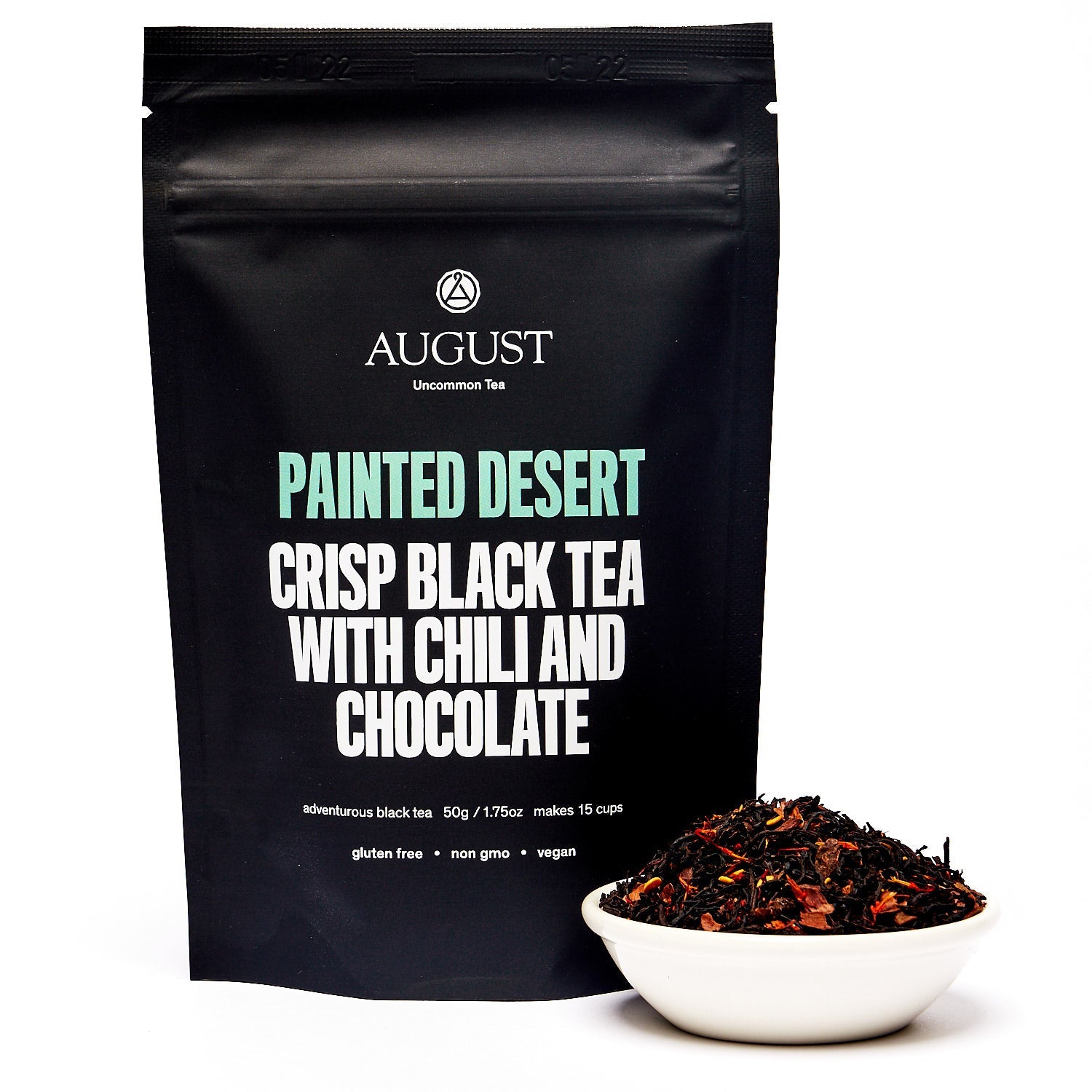 Black tea in a 28-cup tin, Painted Desert Chocolate Chili Black Tea by August Uncommon Tea, with a dark, rich appearance.