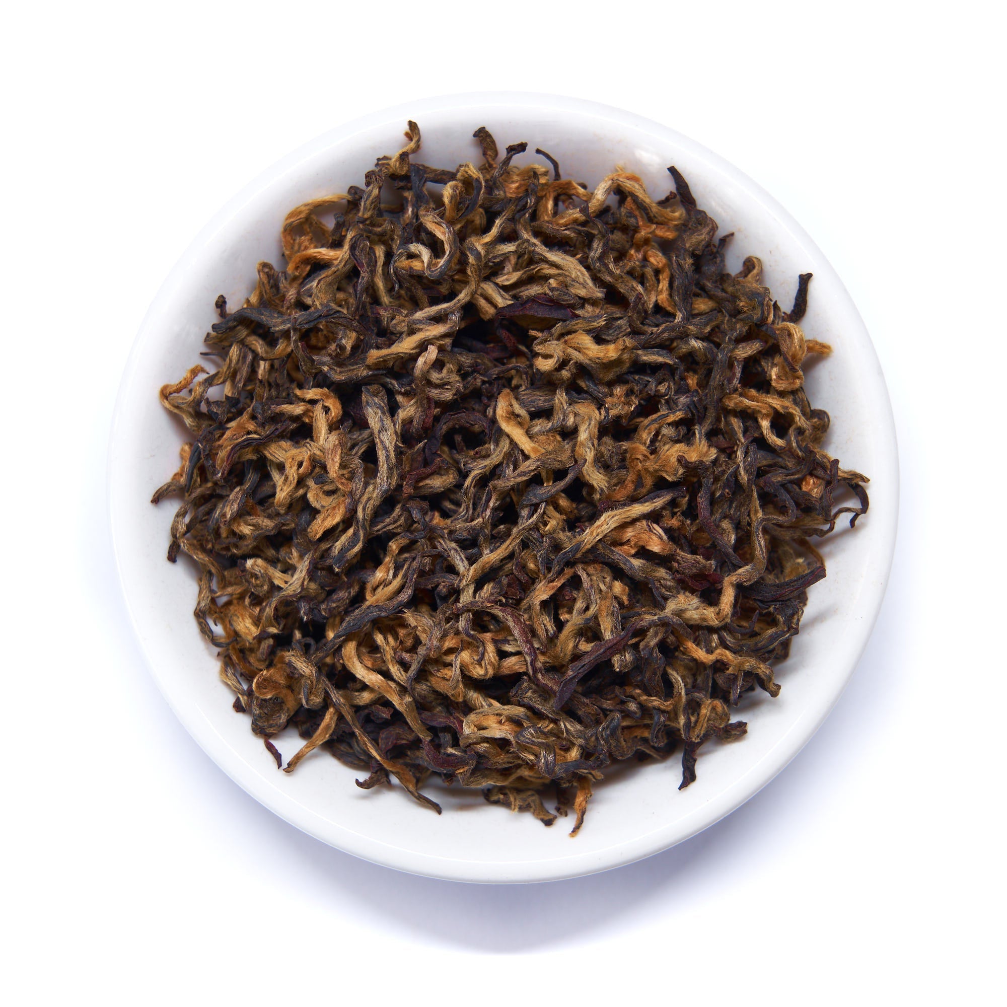 Single estate Nepalese black tea from August Uncommon Tea, featuring rare gold leaves in a 60g tin.