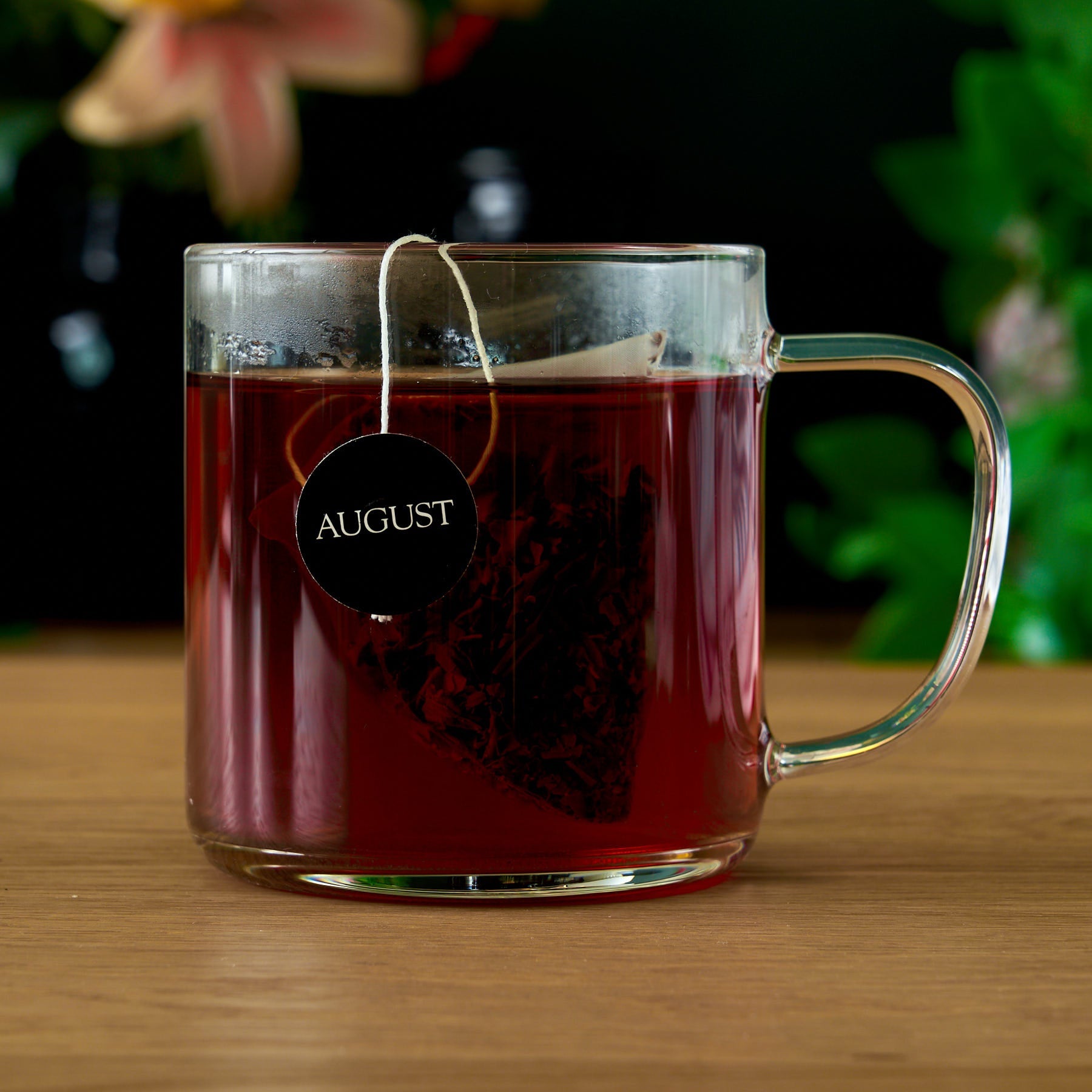 Jet Black Roasty Coffee Black Tea by August Uncommon Tea, 15 tea bags, packaged in a box with black and brown branding.