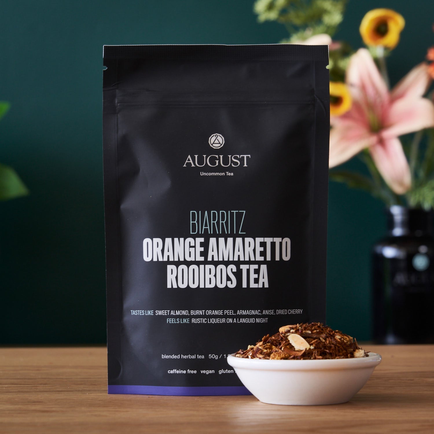 Biarritz Orange Amaretto Rooibos Tea by August Uncommon Tea, caffeine-free herbal tea in a 15-cup bag, with vibrant orange and herbal blend.