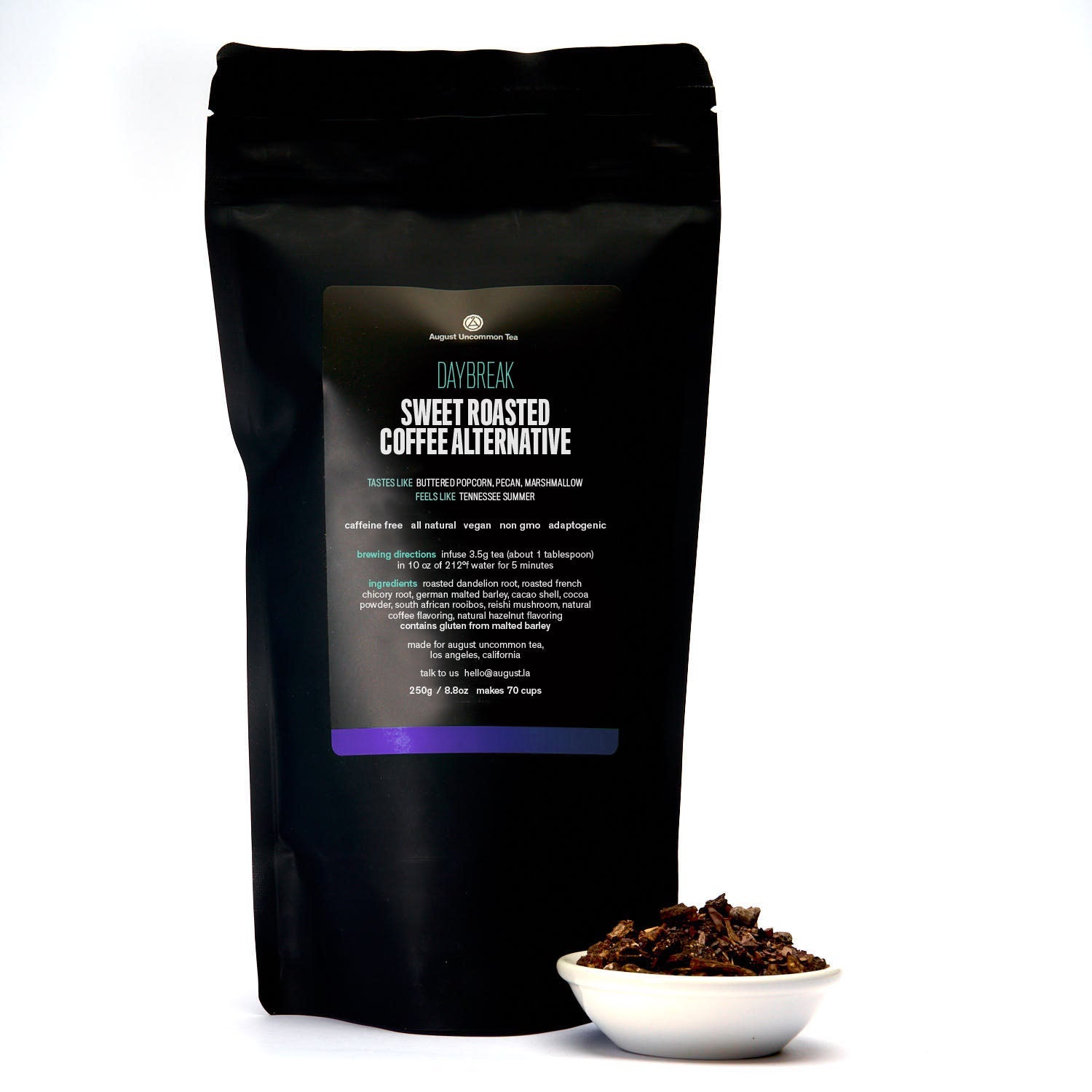 Cup of Daybreak Sweet Roasted Coffee Alternative herbal tea by August Uncommon Tea in a 15-cup bag, caffeine-free beverage.