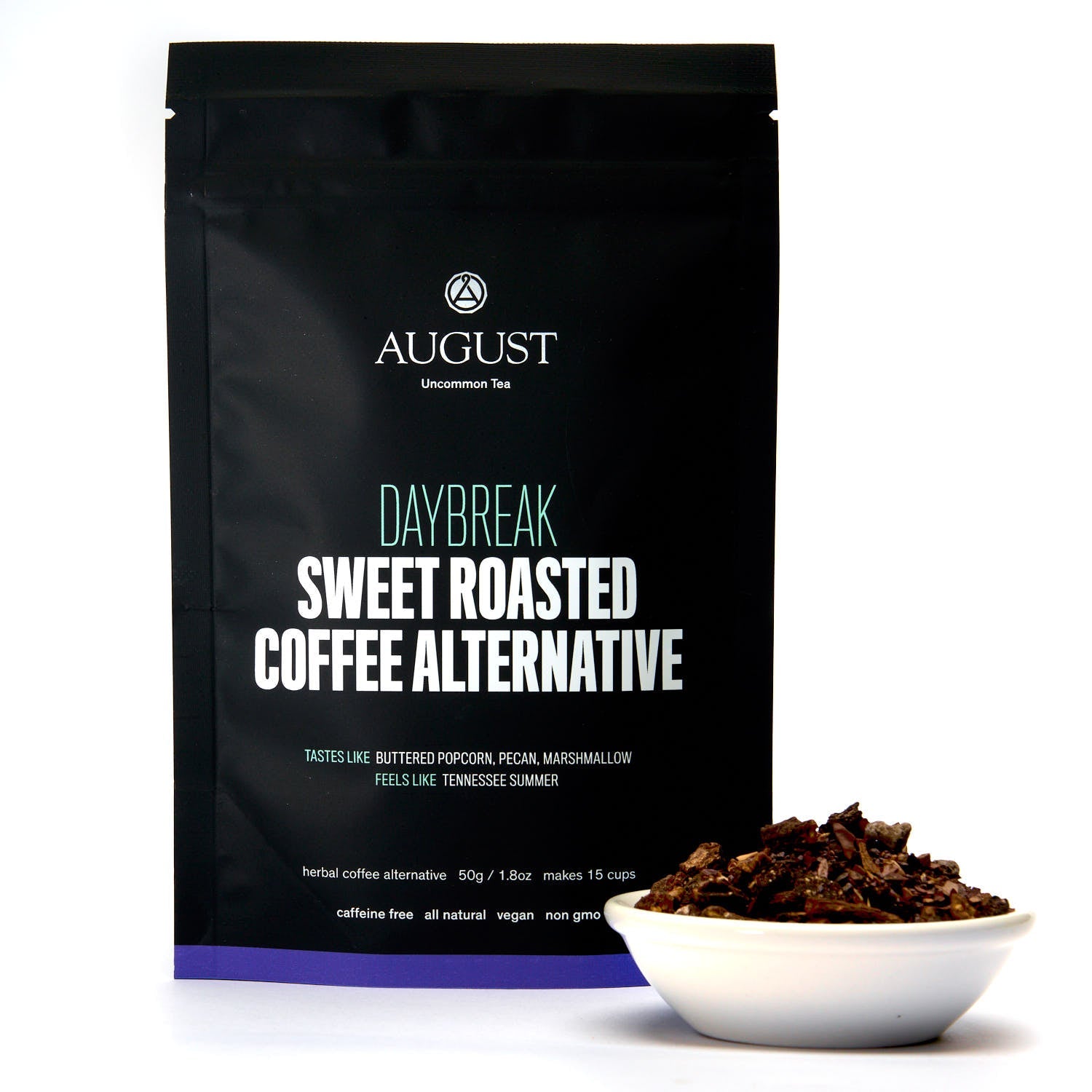 Daybreak sweet roasted coffee alternative herbal tea bag by August Uncommon Tea, caffeine-free beverage with a warm, roasted appearance.