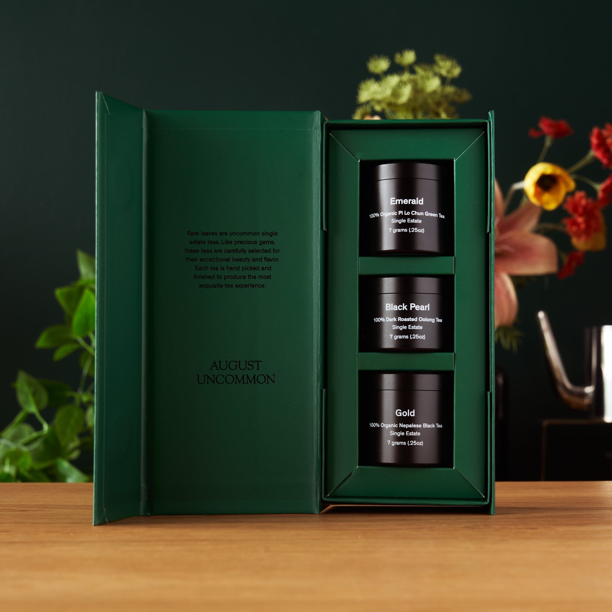 Mini tin of Rare Leaves single origin tea sampler by August Uncommon Tea, featuring assorted high-quality tea leaves.