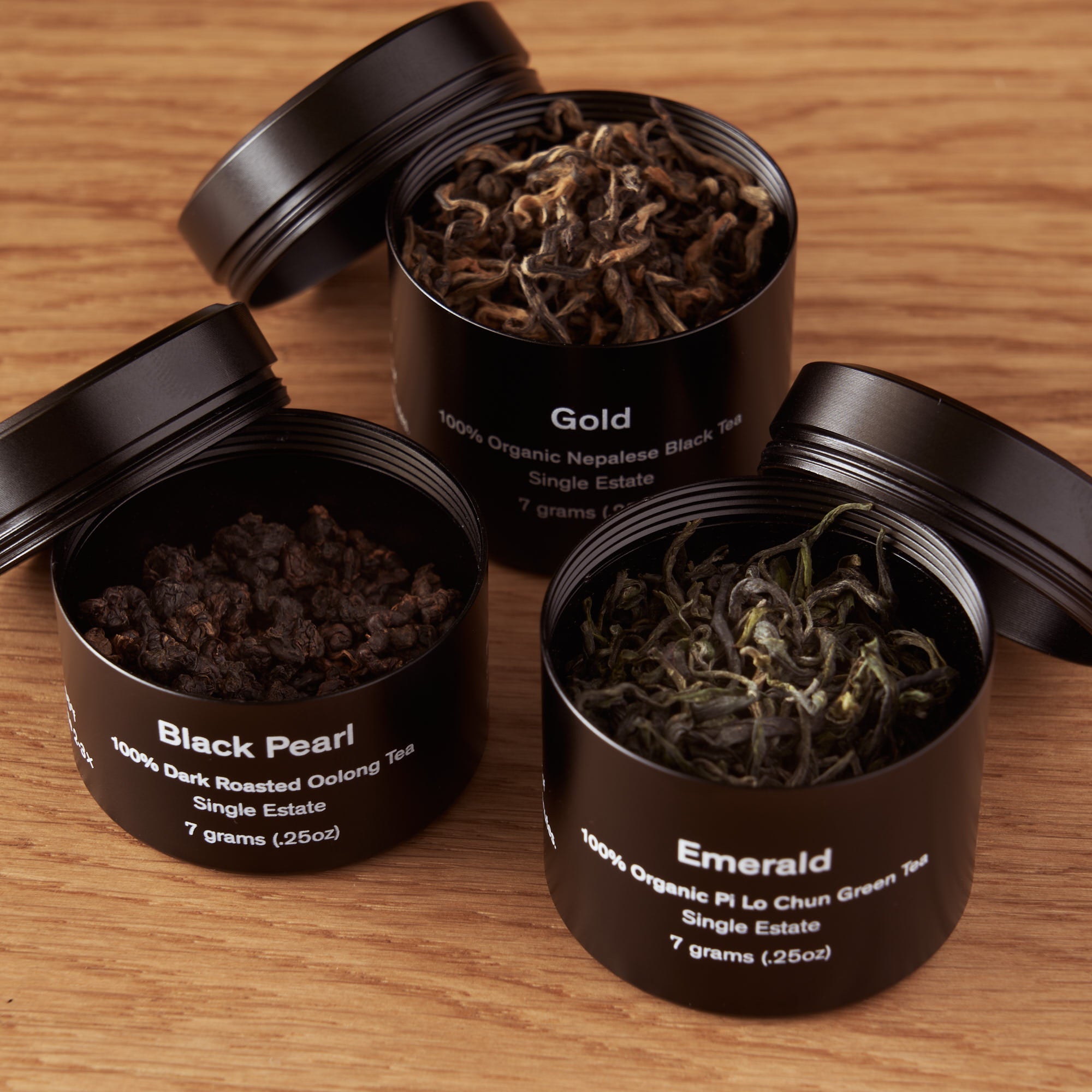 Mini tin of Rare Leaves single origin tea sampler by August Uncommon Tea, featuring an assortment of premium teas in a compact container.