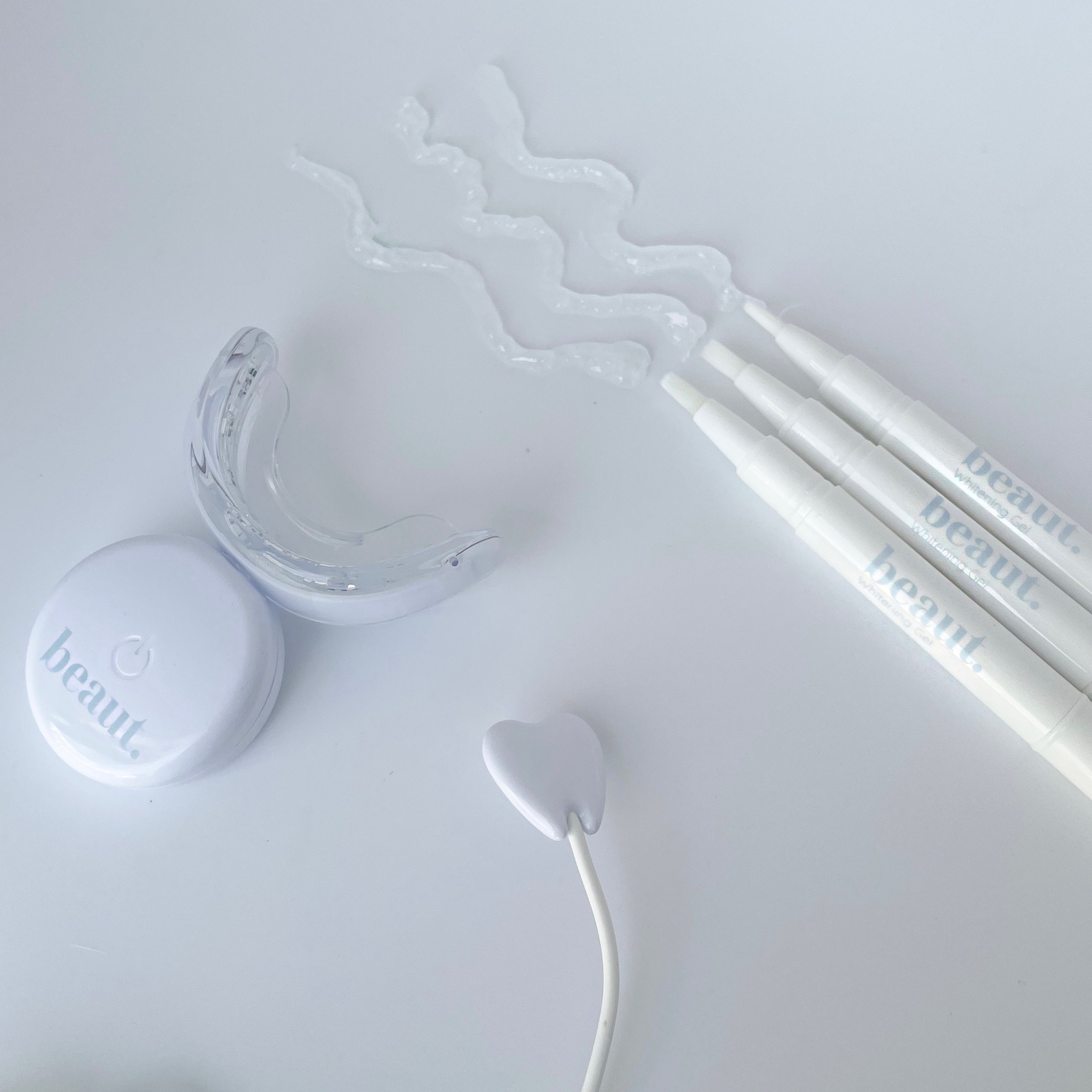 Beauty.co Cozy Smile Kit with skincare products, featuring soft textures and natural ingredients for a comfortable, radiant smile.