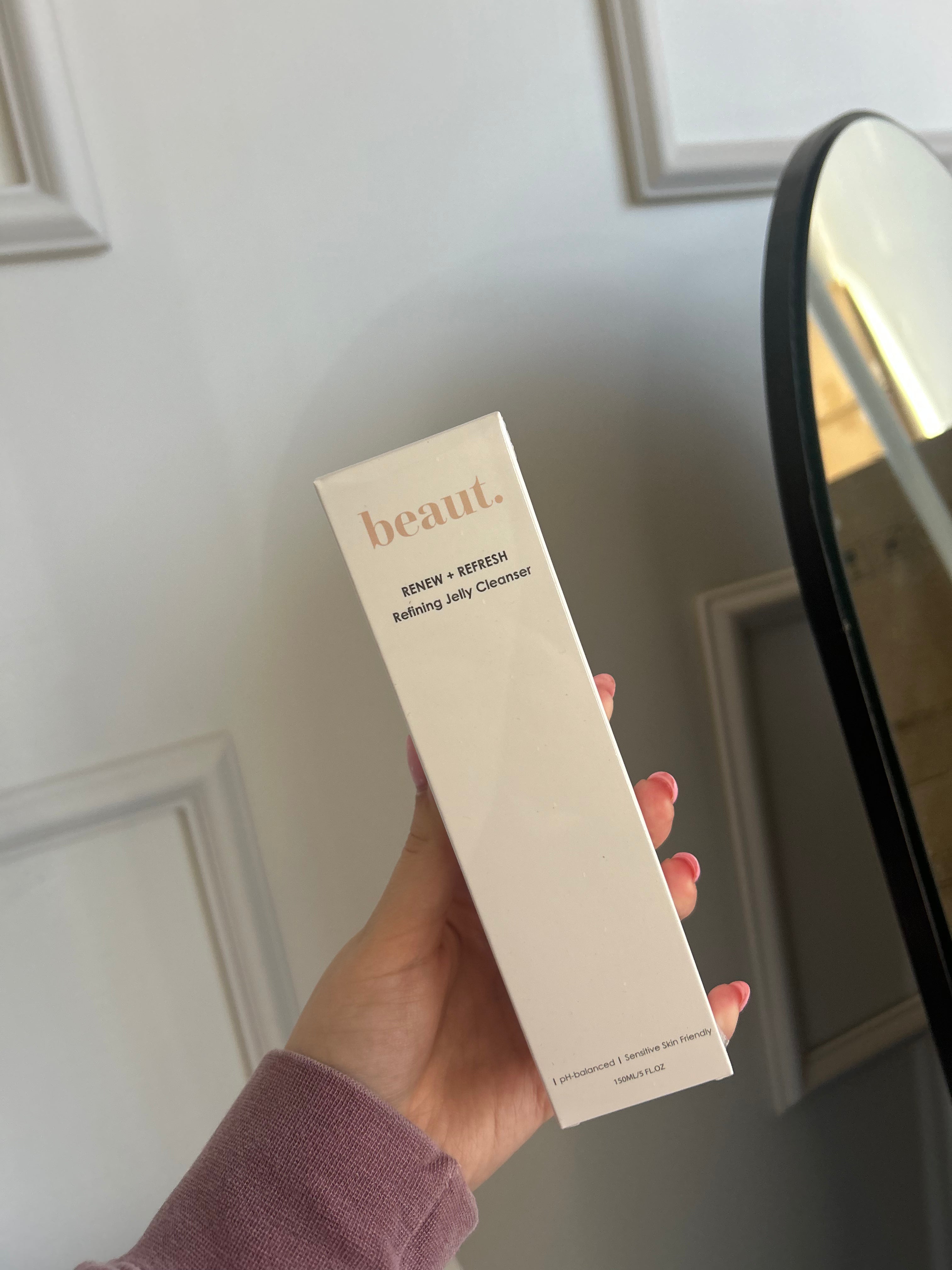Beaut.beautyco. Jelly Refining Cleanser in a clear bottle with a gel-like texture and a pump dispenser on a white background.