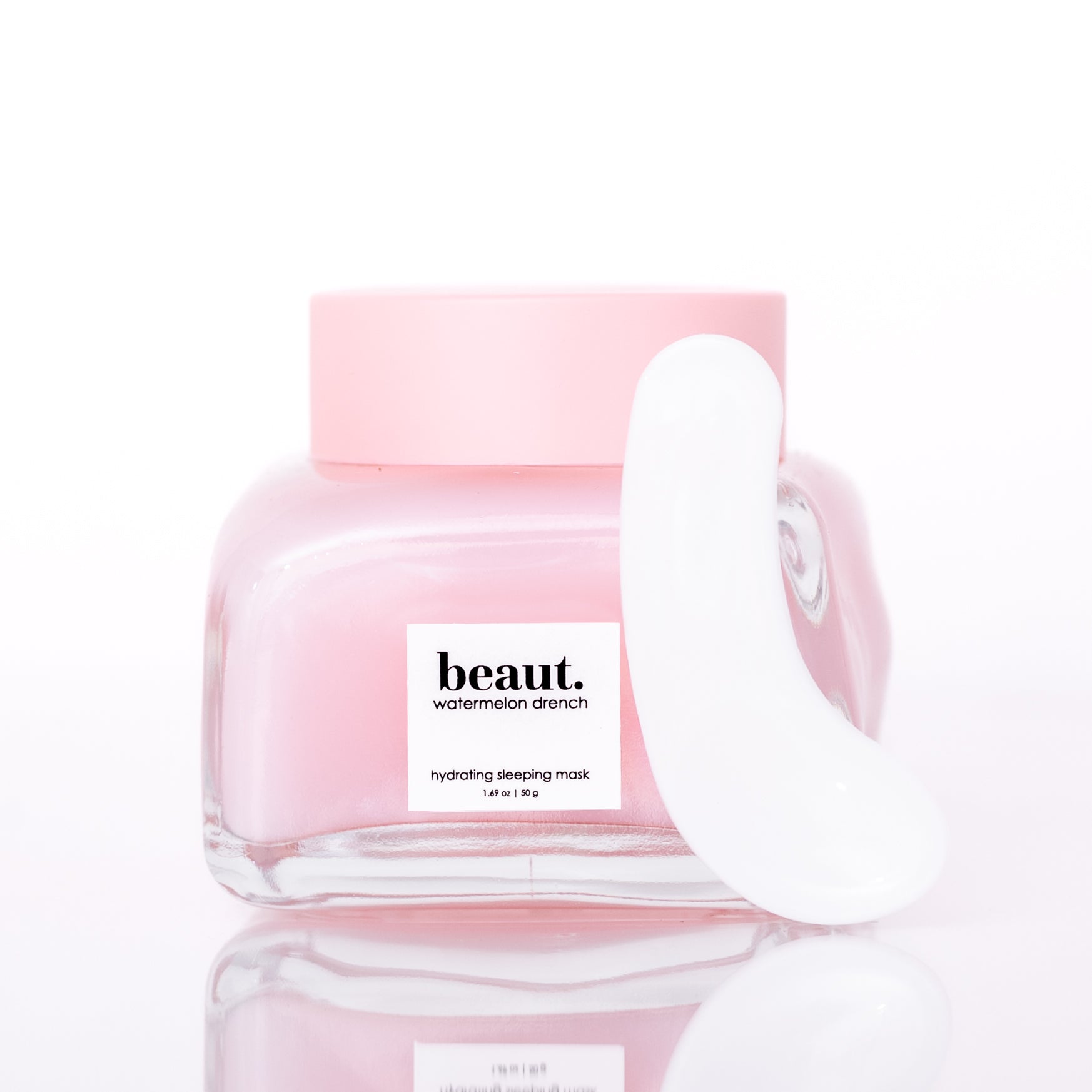 Beauty.co Watermelon Drench hydrating facial mist in a clear spray bottle with a watermelon-themed label, ready for skincare use.