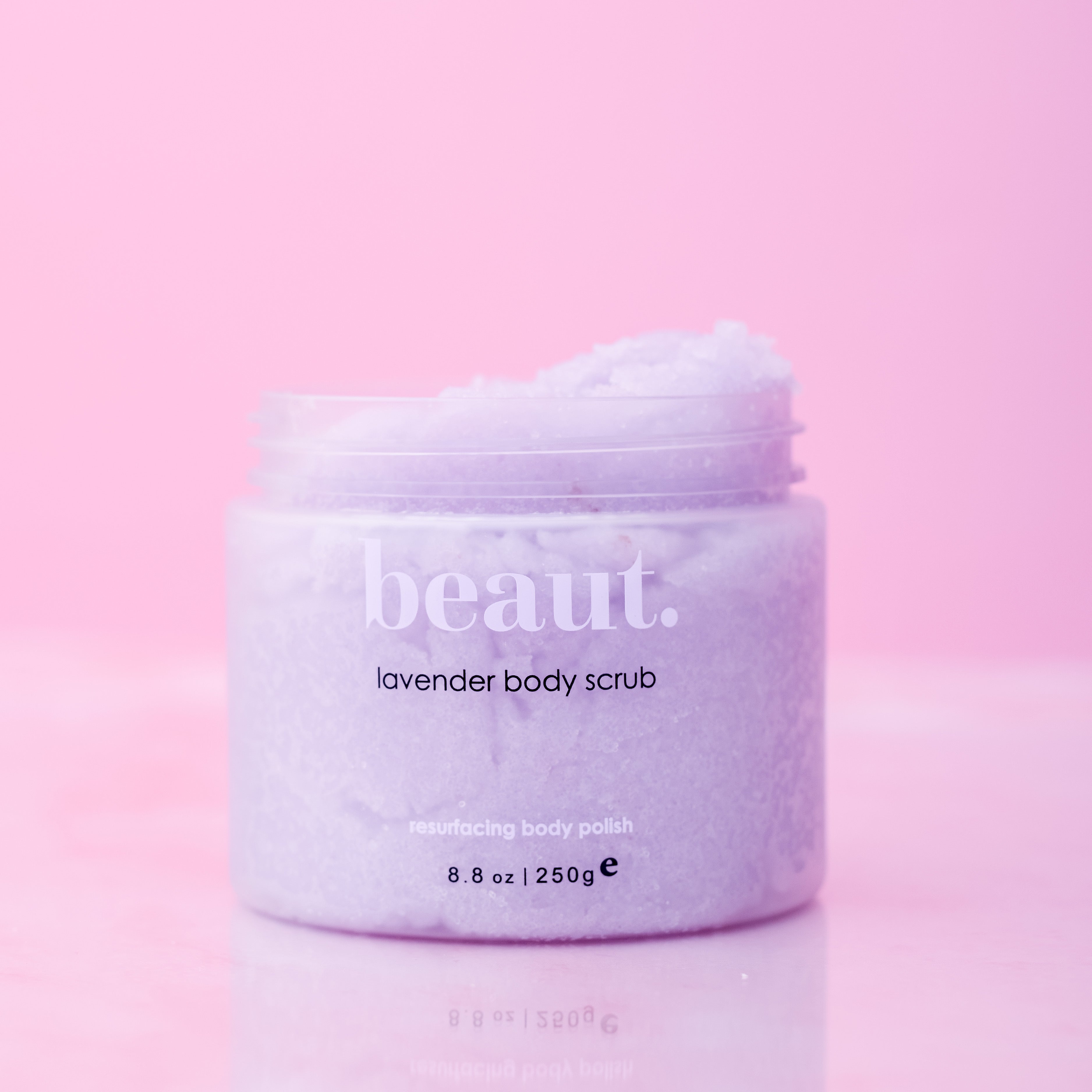 Lavender body scrub by beaut.beautyco featuring exfoliating texture and lavender scent in a jar.