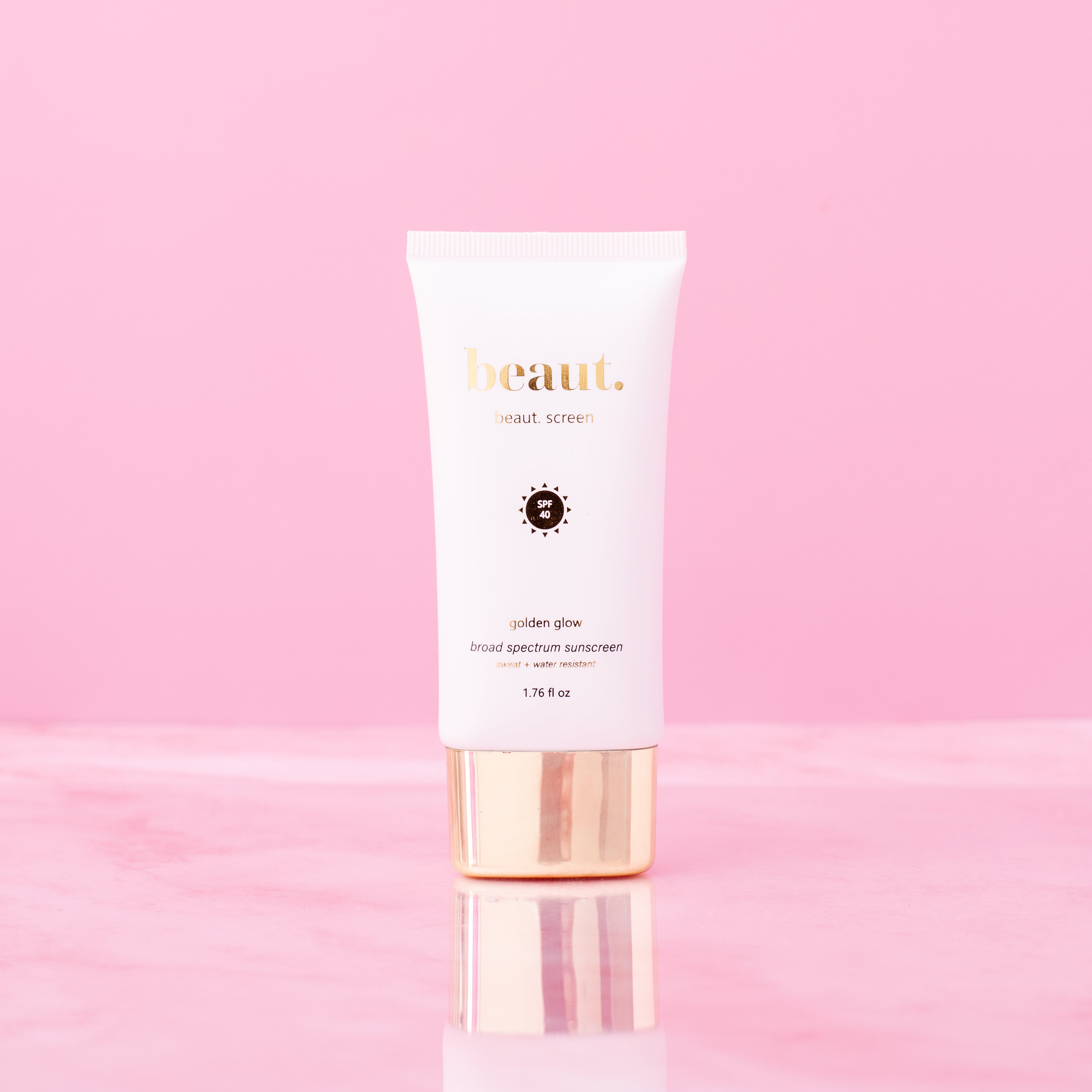 Beaut.beautyco. Beaut.screen Golden Glow, close-up of the skincare product with gold accents in sleek packaging.
