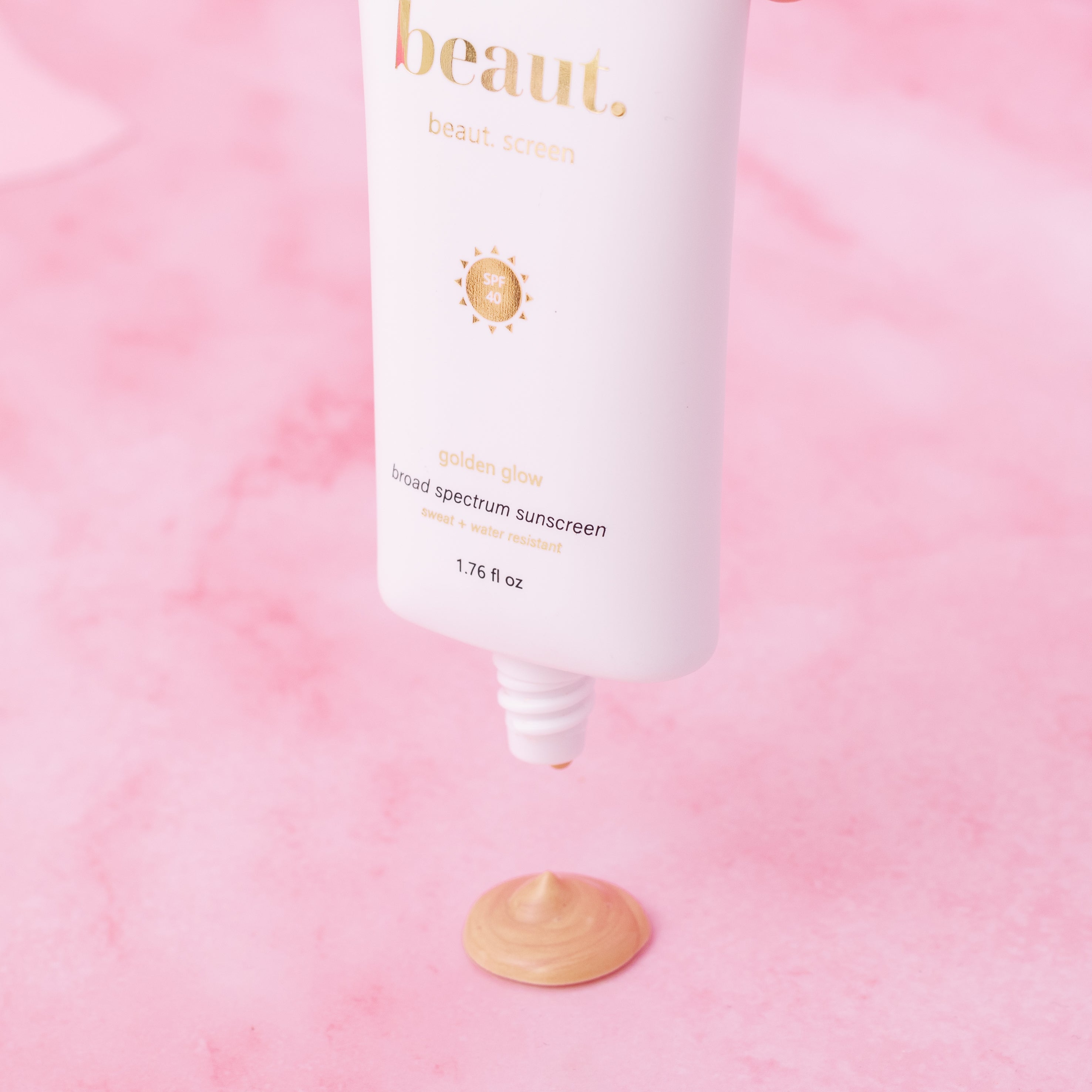 Beaut.screen Golden Glow by beaut.beautyco. featuring a sleek, golden-hued beauty screen device with a smooth surface and modern design.