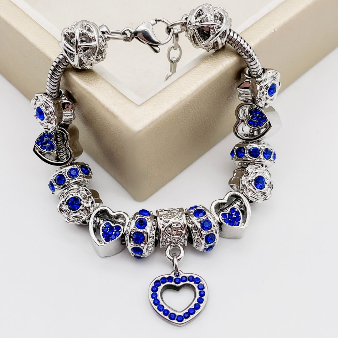 Colorful birthstone bracelets by Bella's Yard featuring various gemstones on elegant bracelet bands.