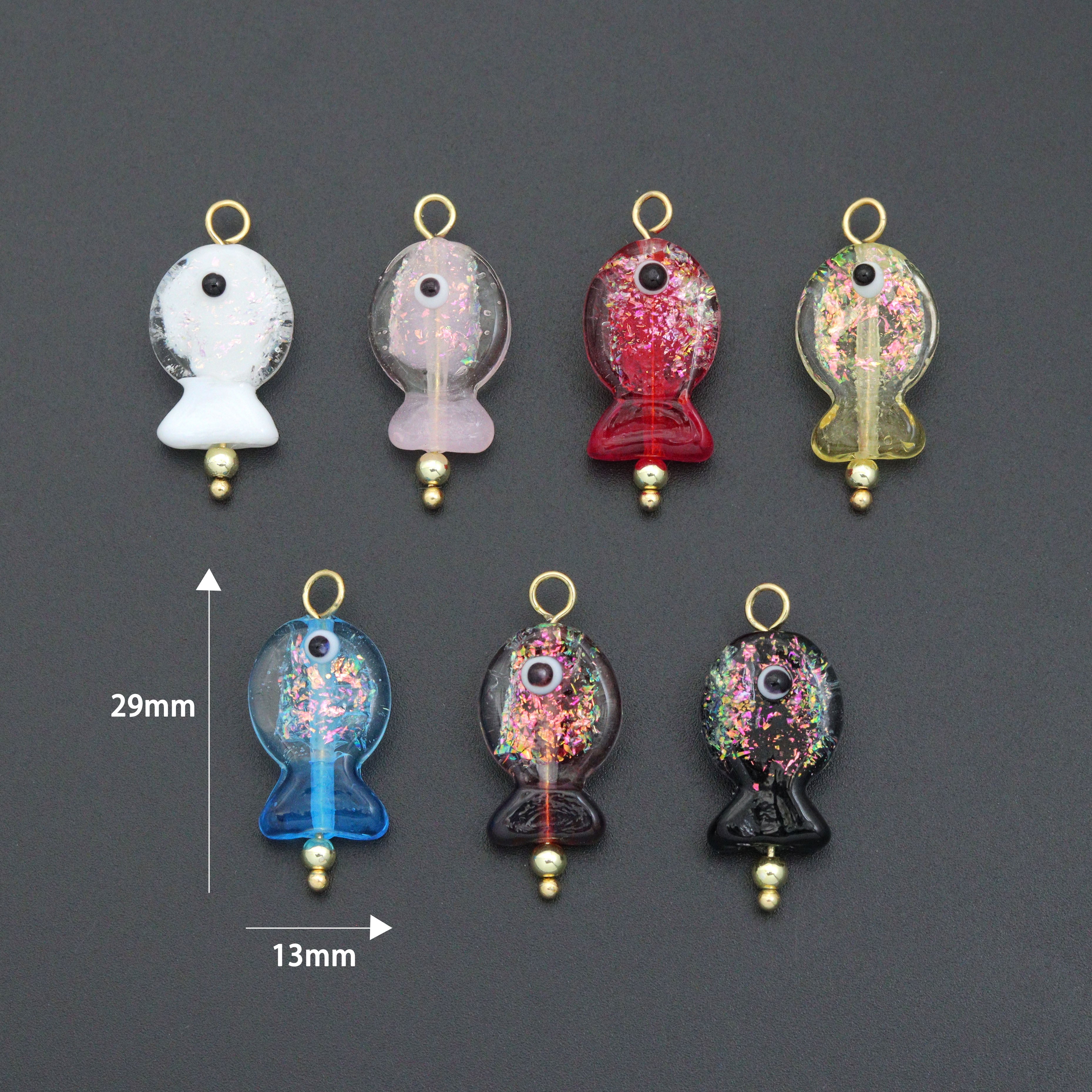 Handmade colorful glitter fish charm with evil eye design, crafted by Bestbeads&Beyond, featuring vibrant colors and intricate details.