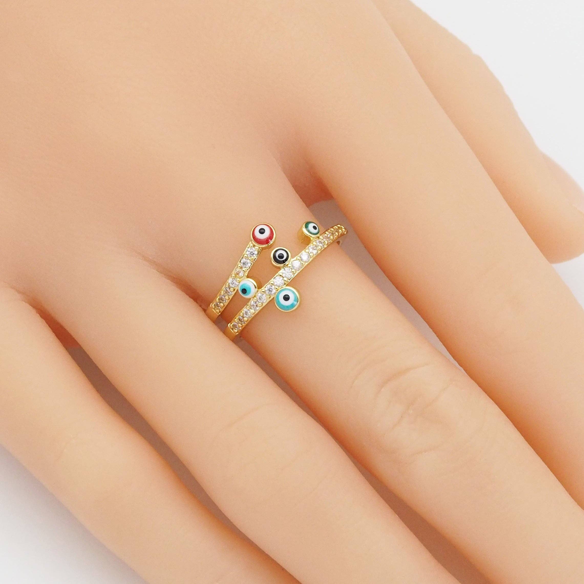 Gold CZ enamel evil eye cocktail ring from Bestbeads & Beyond, adjustable statement jewelry with vibrant design.
