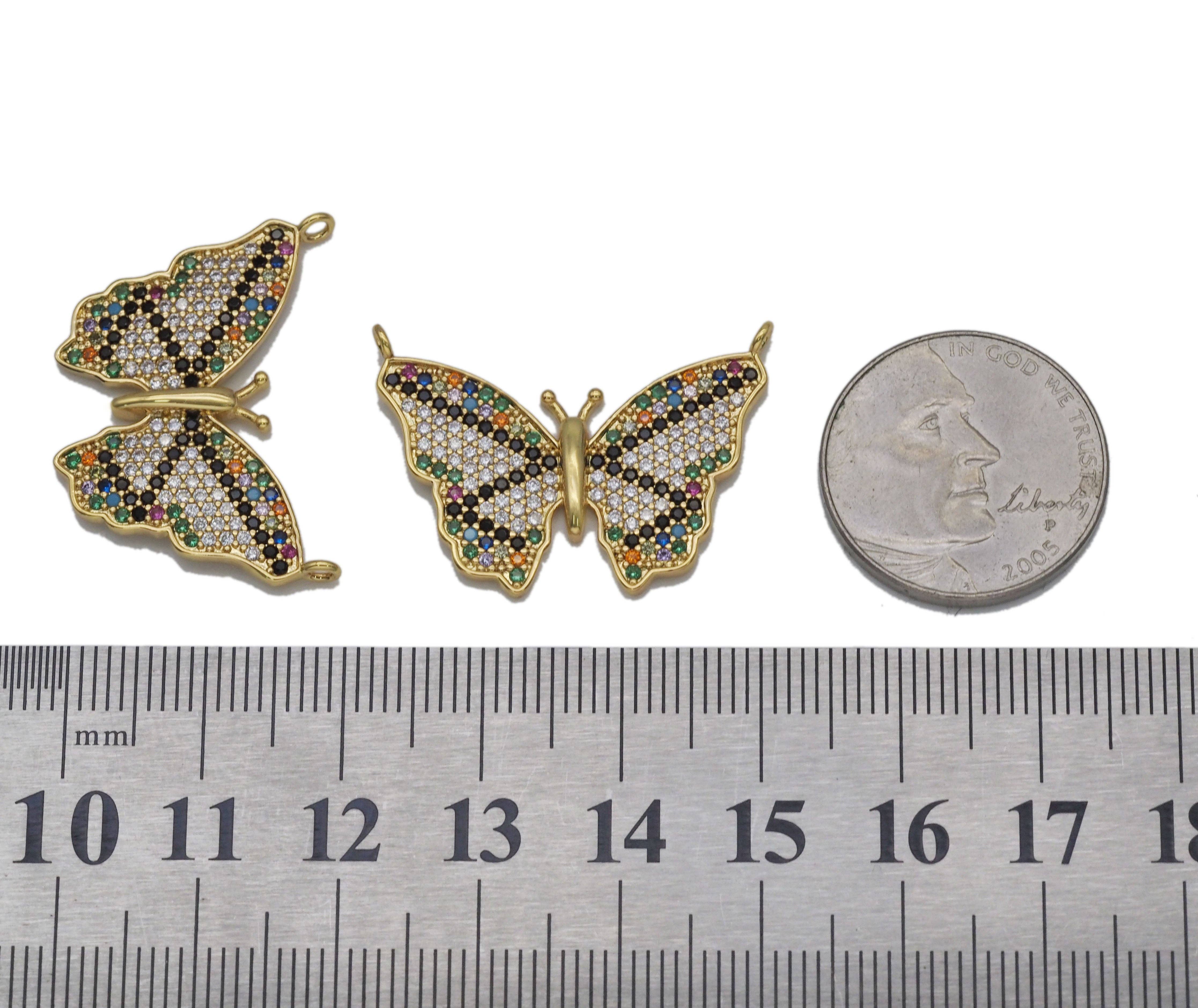 Gold colorful CZ butterfly charm pendant from Bestbeads & Beyond, showcasing vibrant cubic zirconia details and intricate butterfly design.