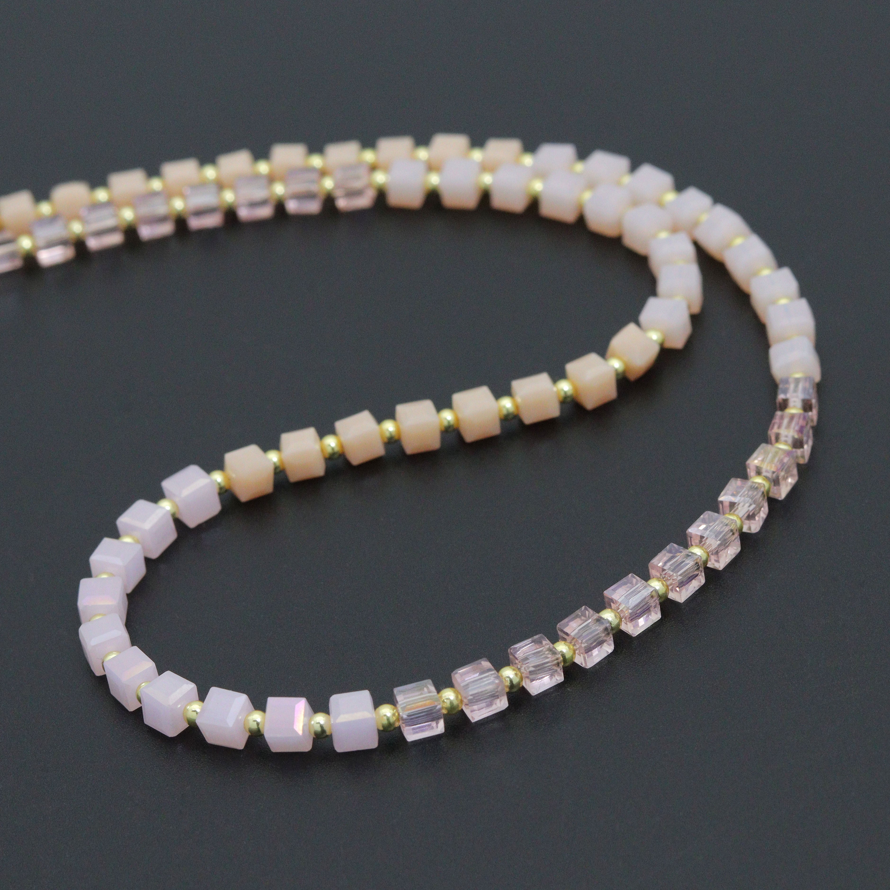 Ombré pink champagne cube beads jewelry set including necklace and bracelet by Bestbeads&Beyond, featuring colorful cube bead designs.