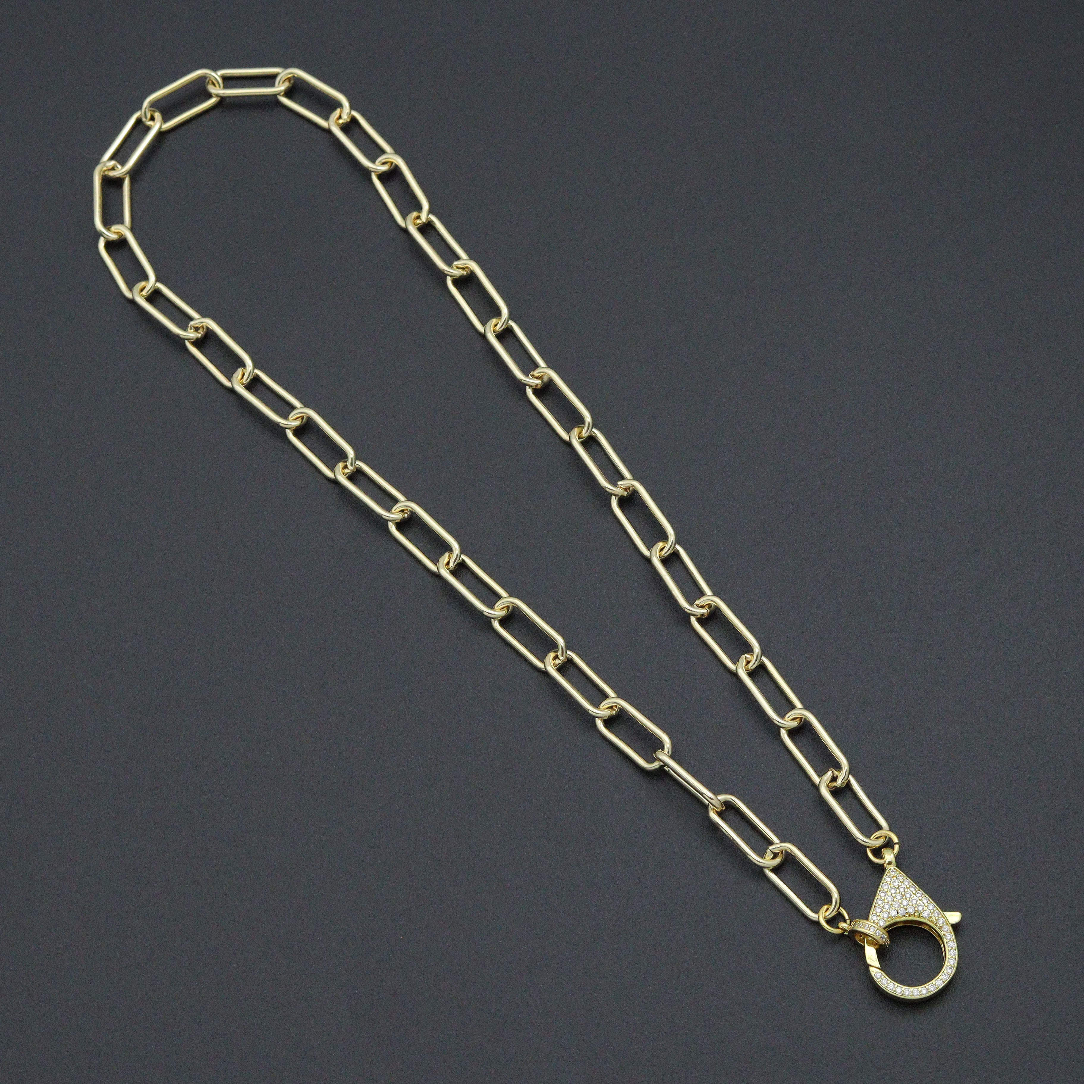 Bestbeads & Beyond paperclip link chain necklace with CZ lobster clasp, showcasing shiny metal links and sparkling cubic zirconia accents.